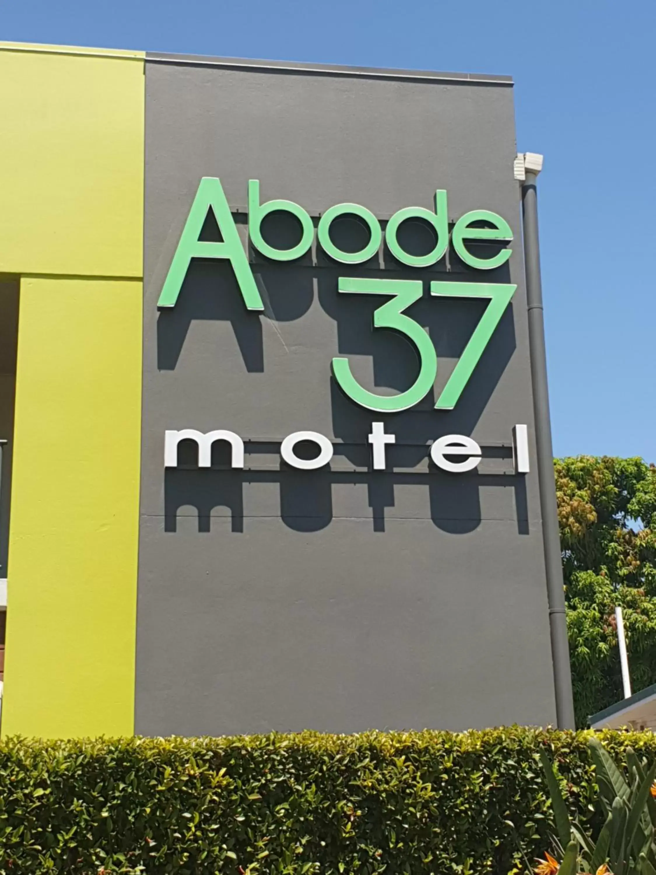 Property logo or sign in Abode37 Motel Emerald