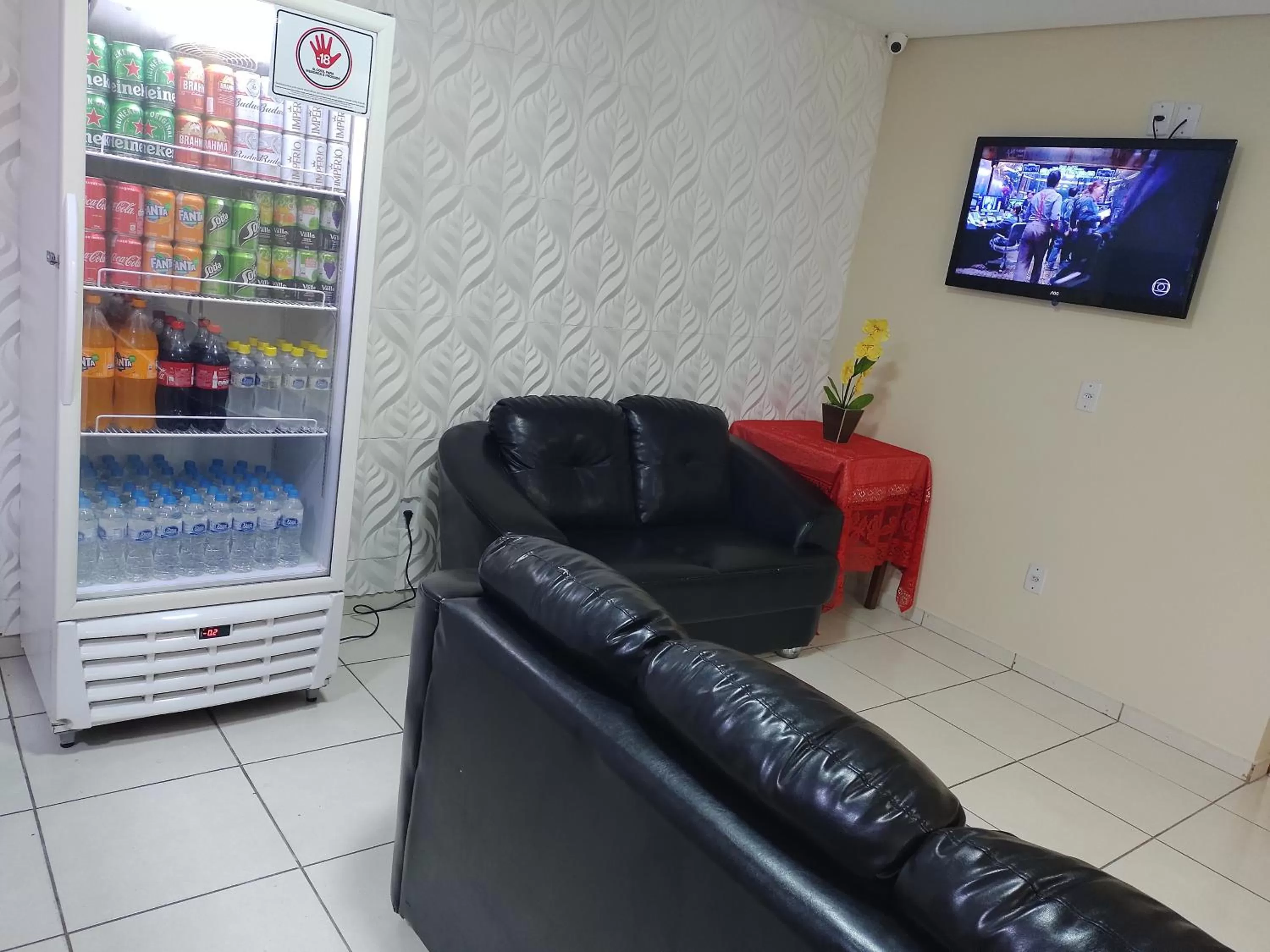 Communal lounge/ TV room in Pousada Bella Vista