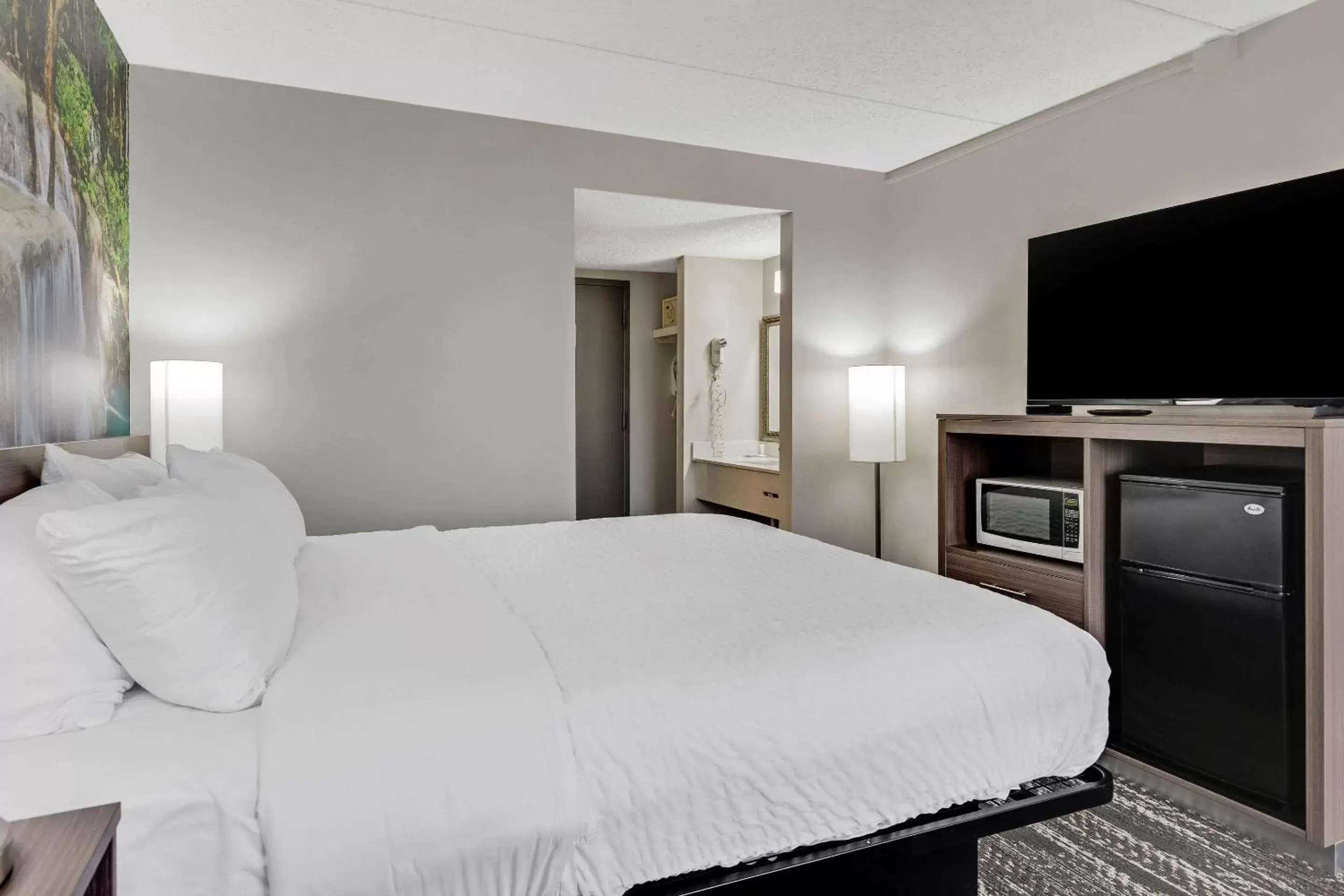 Bedroom, Bed in Clarion Pointe by Choice Hotel