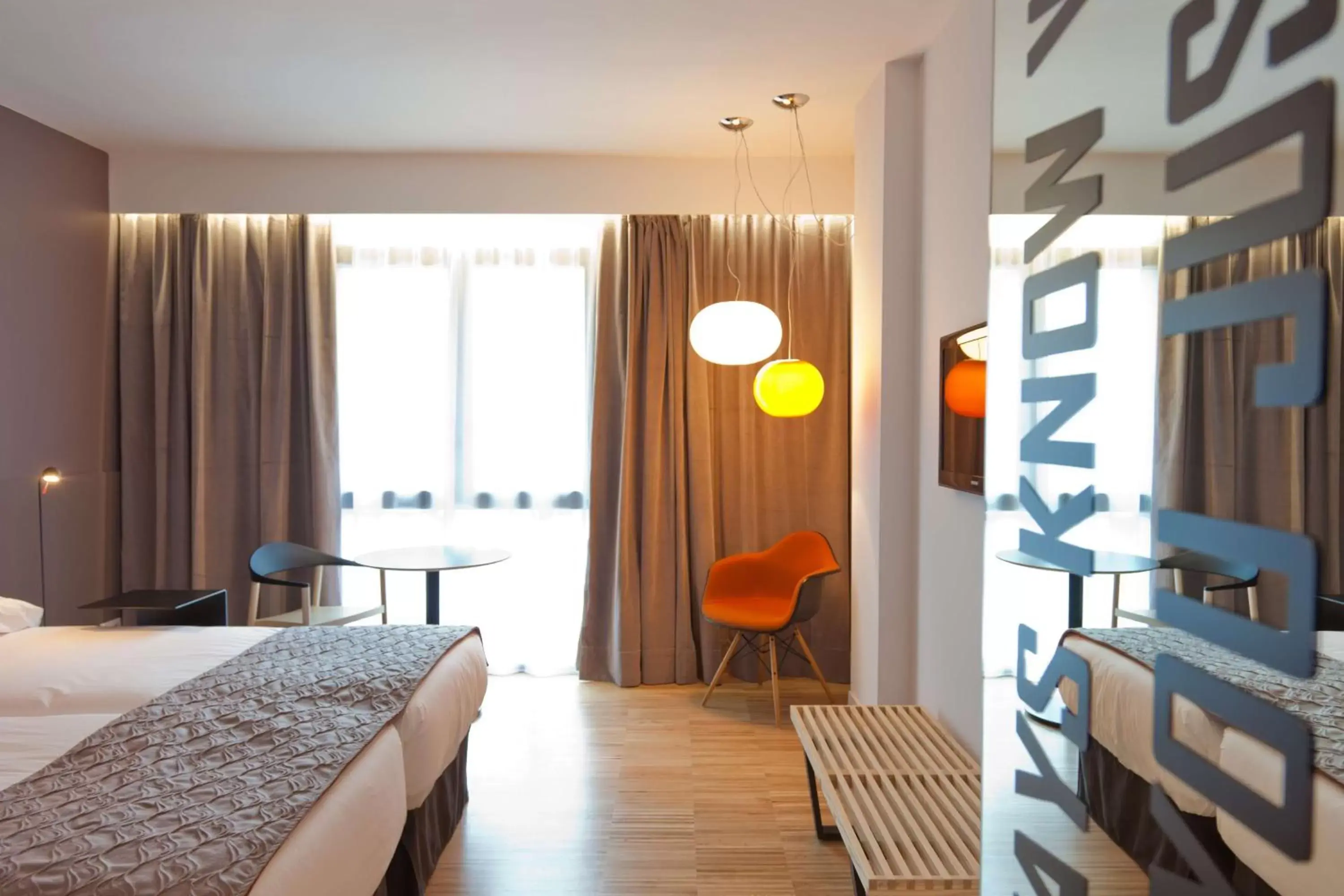Bed, TV/Entertainment Center in Alexandra Barcelona Hotel, Curio Collection by Hilton