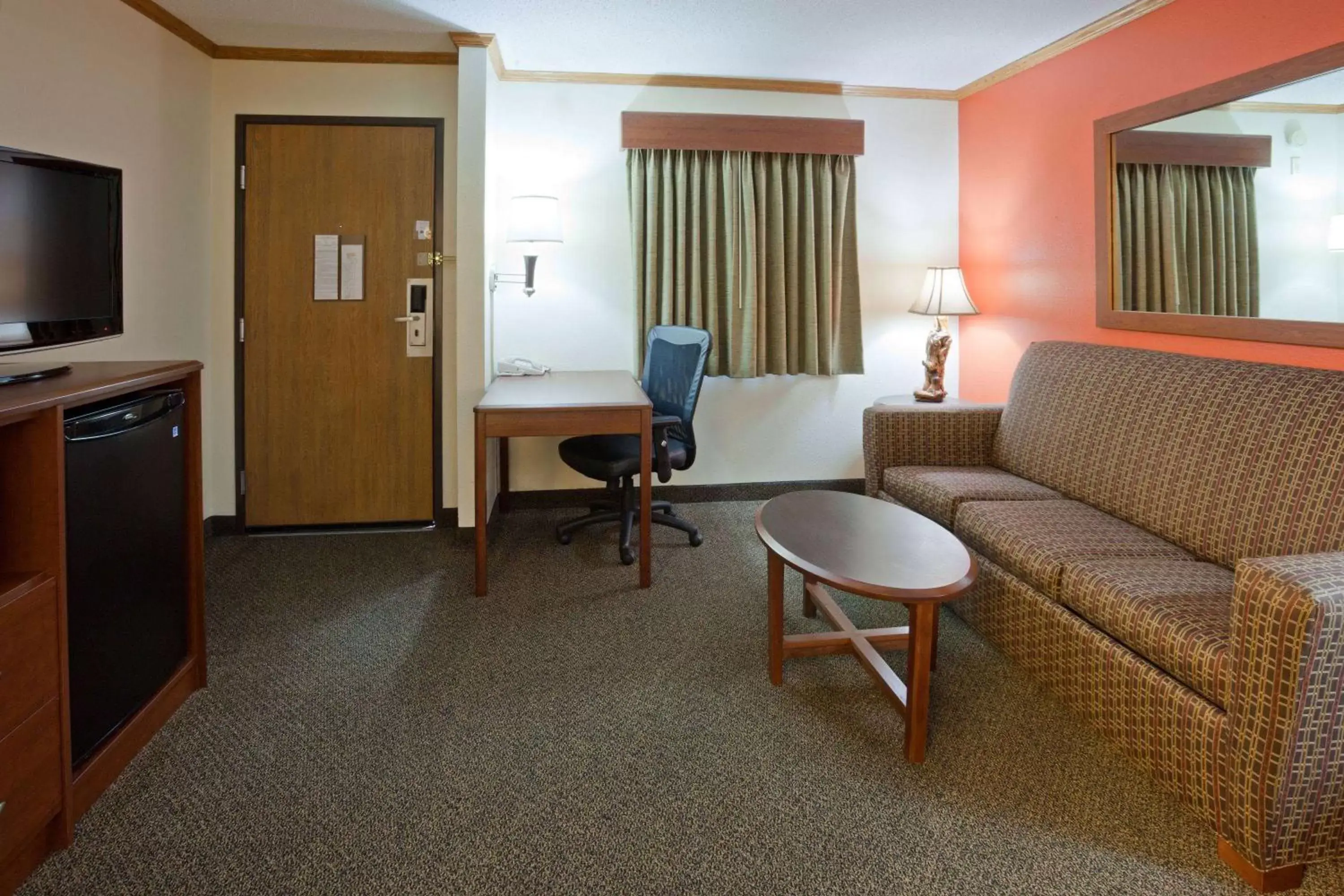 Photo of the whole room, Seating Area in AmericInn by Wyndham Virginia