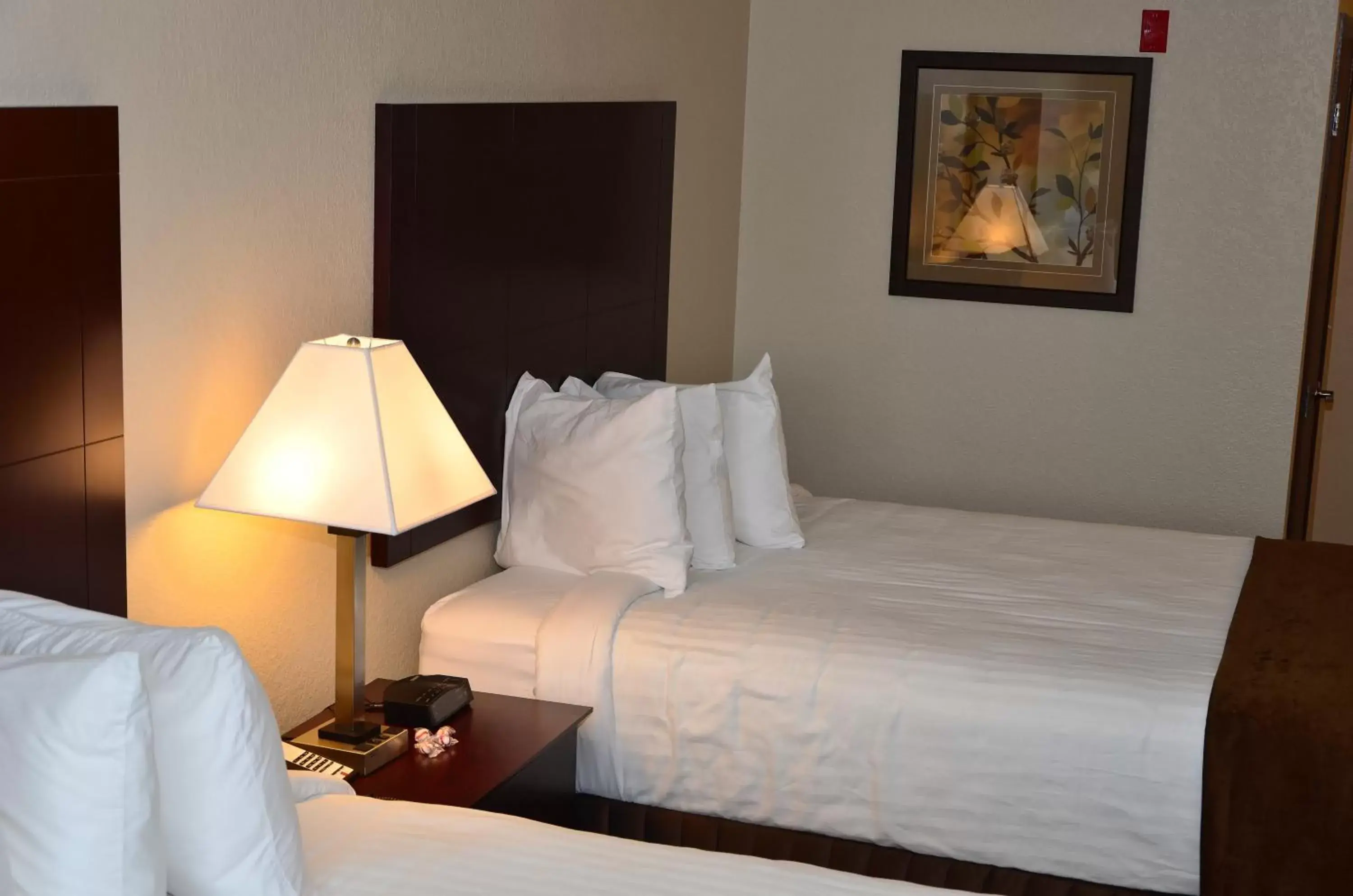 Bed in Cobblestone Inn & Suites - Clarion