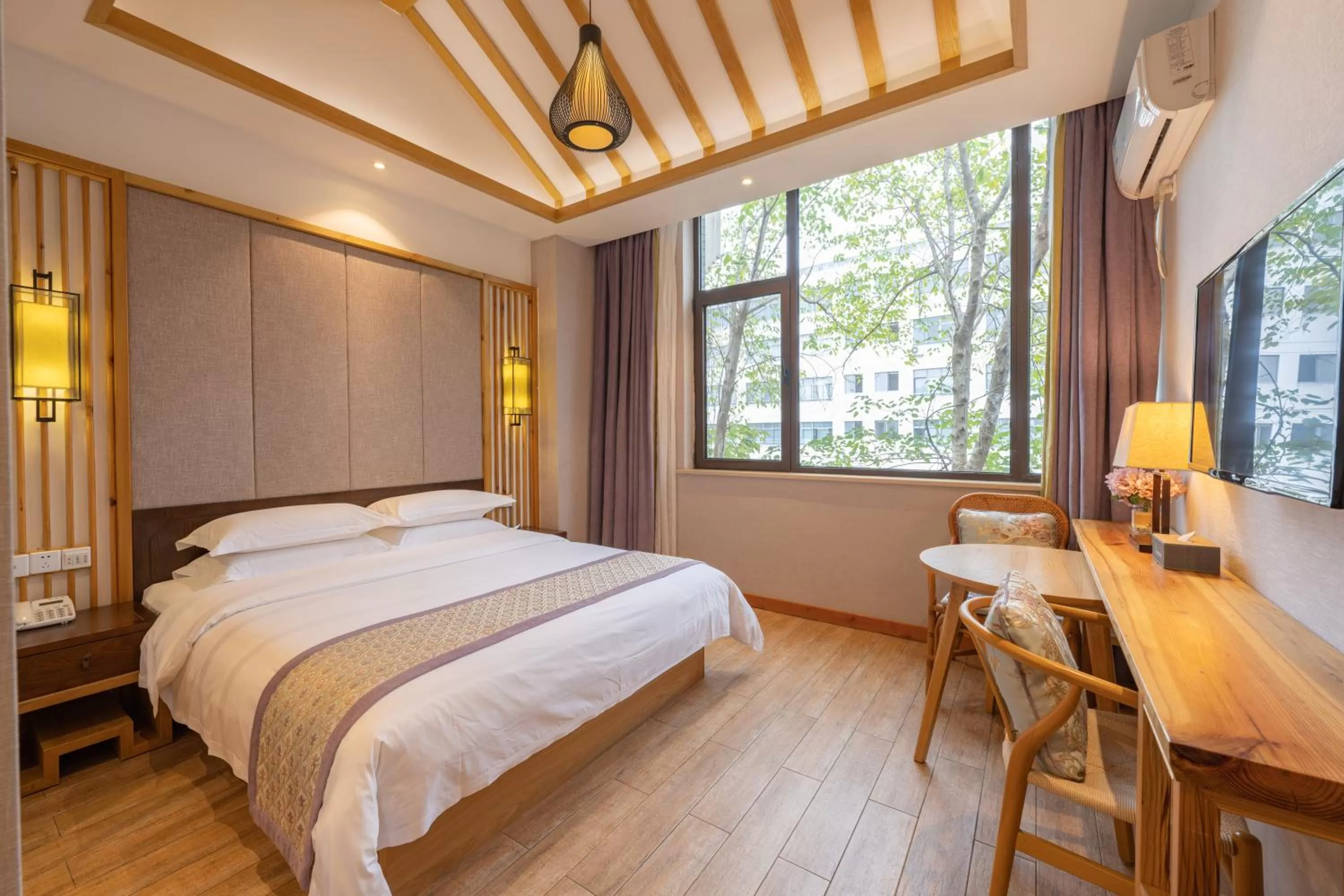 Bed in Mild Spring Boutique Hotel