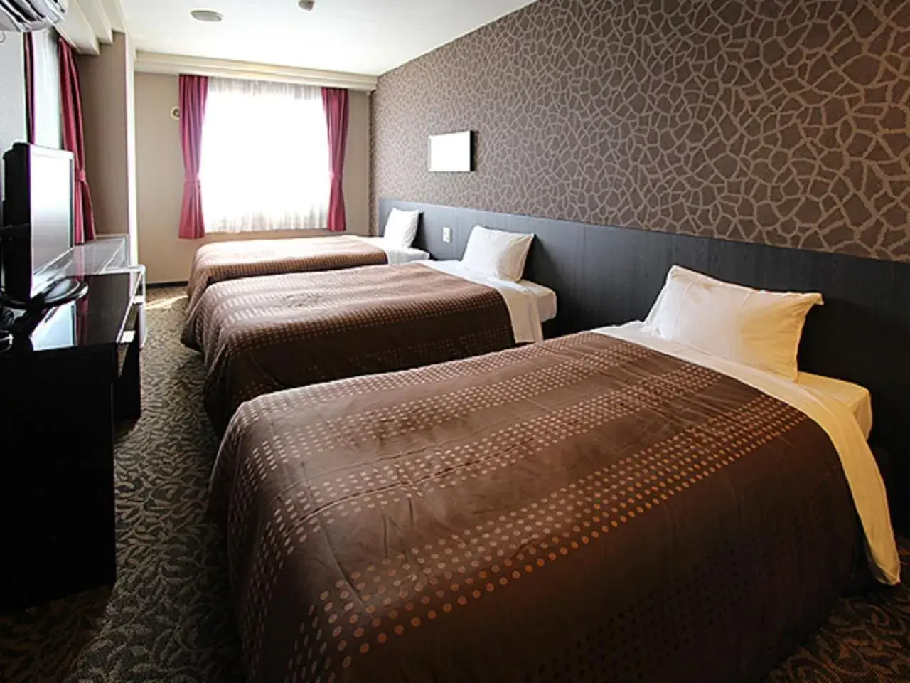 Bed in HOTEL LiVEMAX BUDGET Kobe