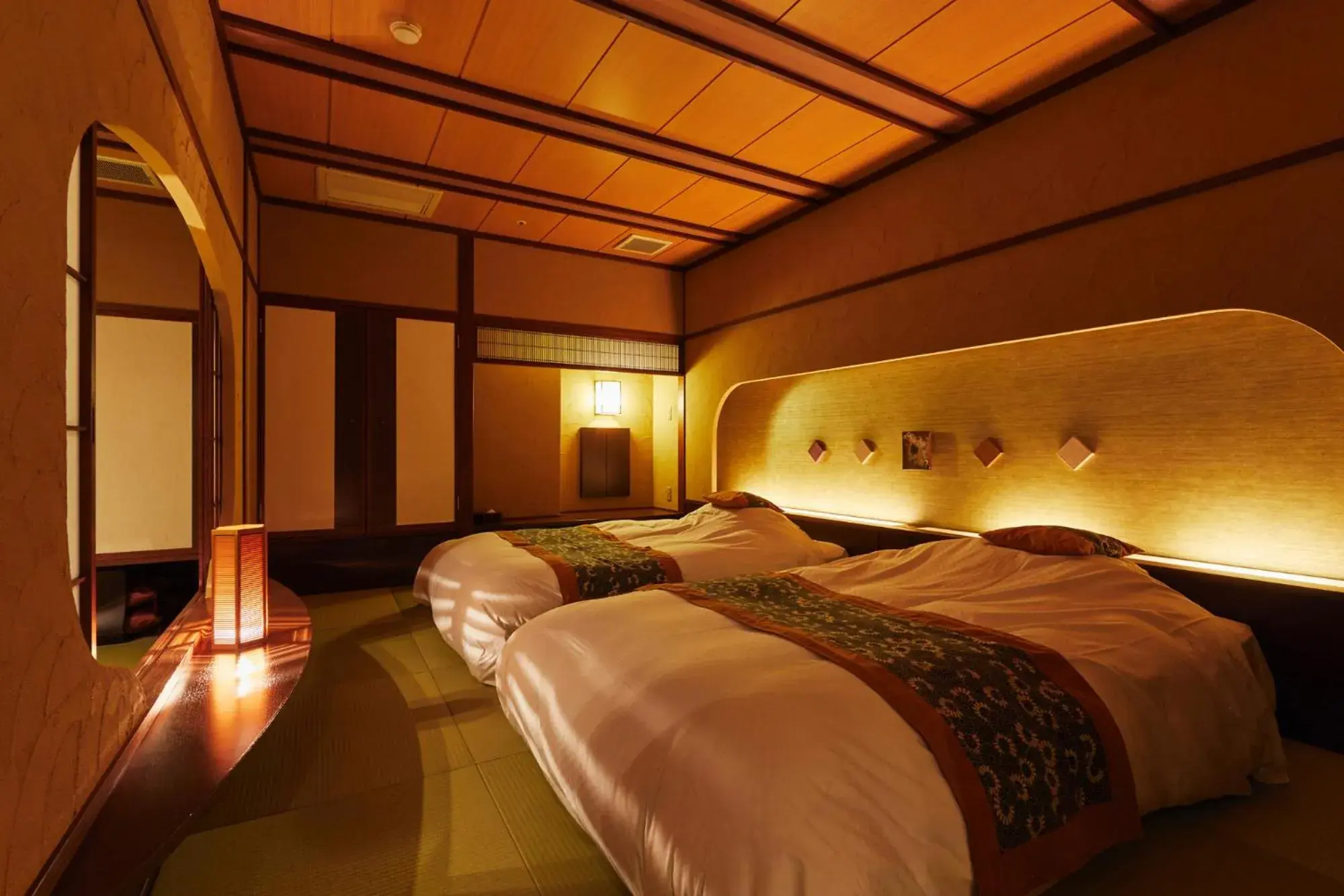 Bed in Takinoyu Hotel