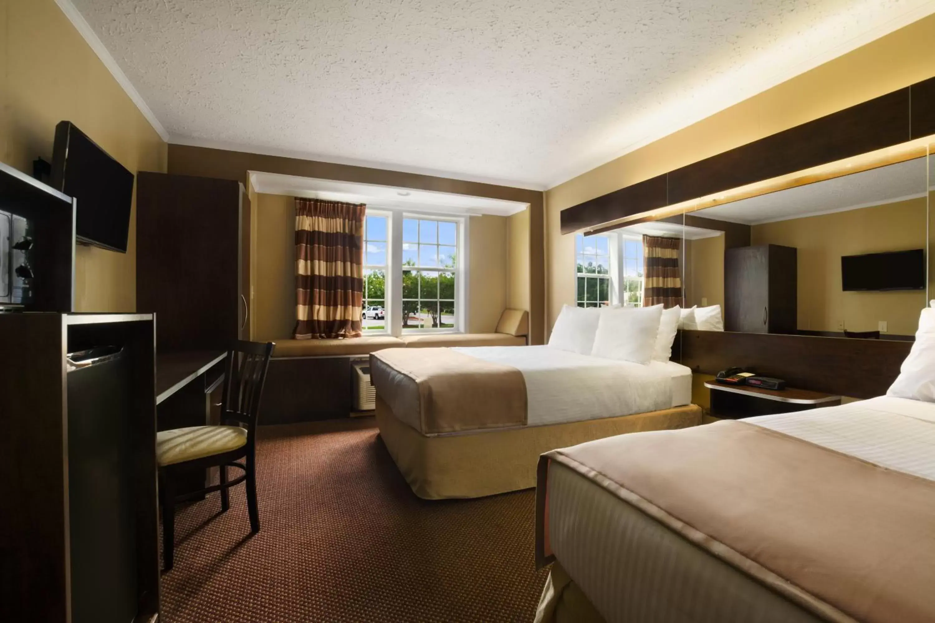 Bed in Microtel Inn & Suites by Wyndham Columbia Fort Jackson N