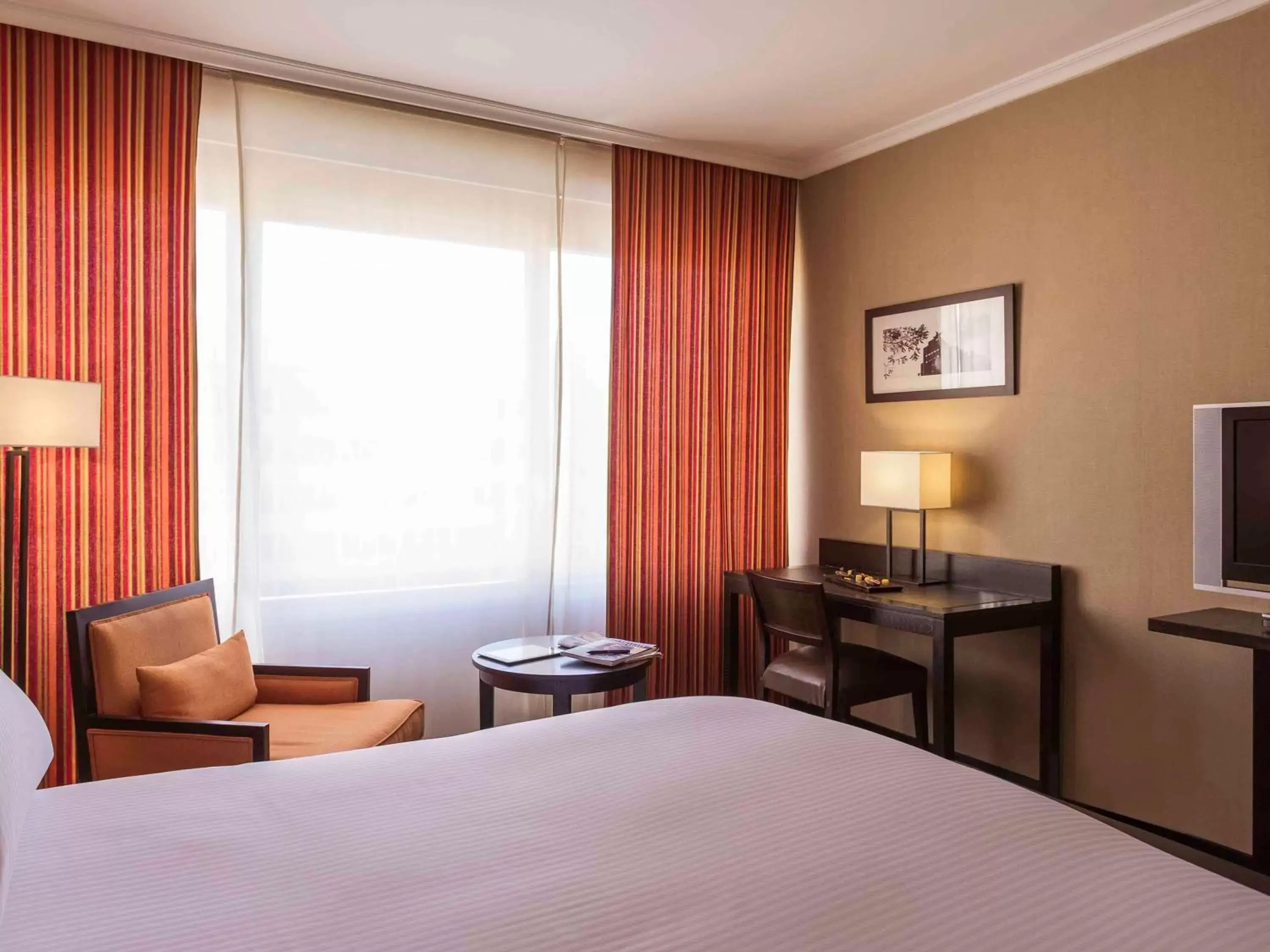 Photo of the whole room, Bed in Pullman Madrid Airport & Feria