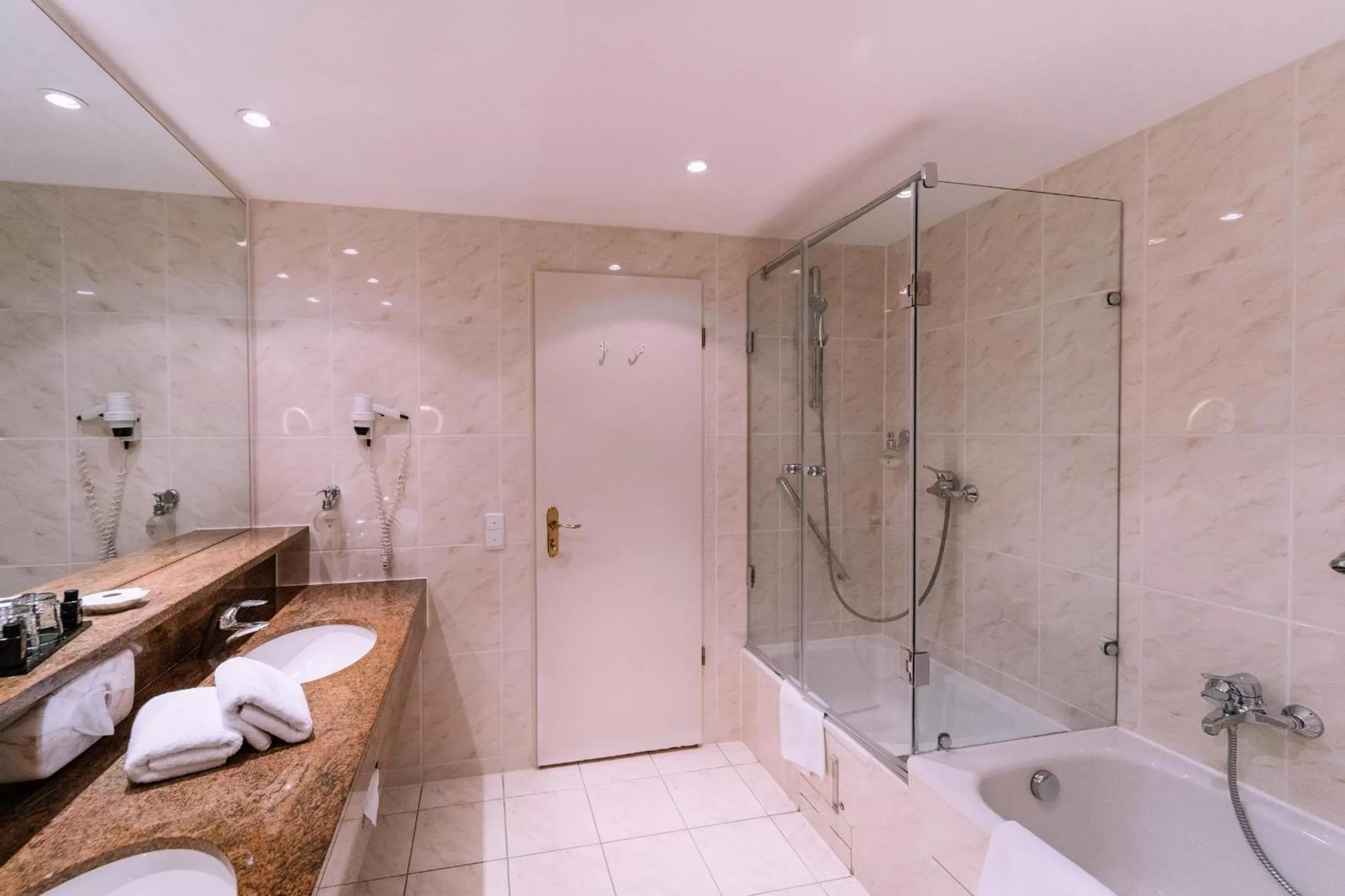 Bathroom in Atomis Hotel Munich Airport by Mercure