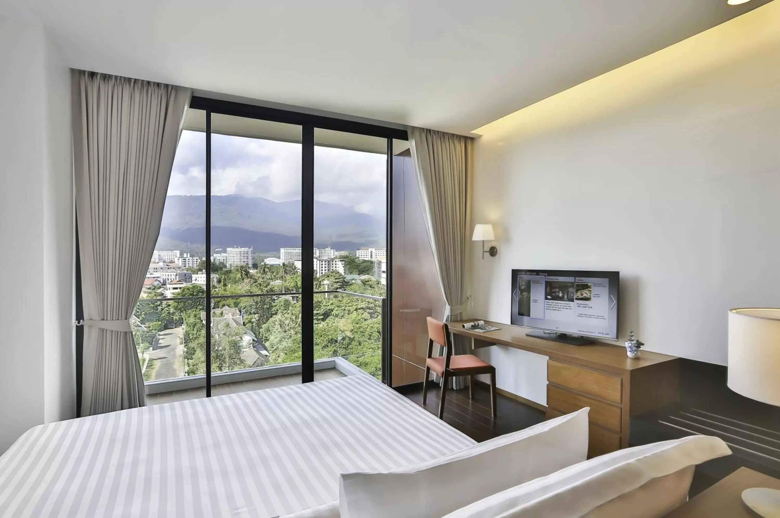 Bedroom, Mountain View in Eastin Tan Hotel Chiang Mai