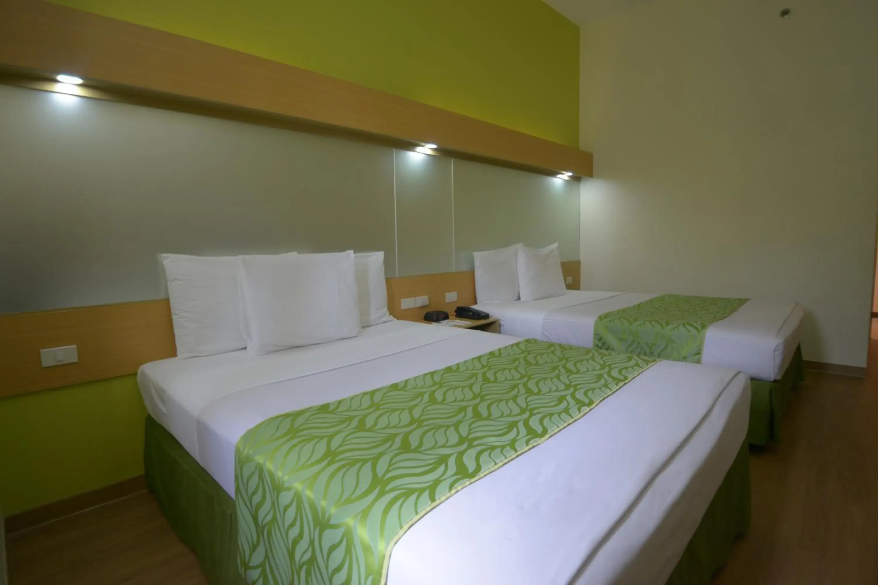 Photo of the whole room, Bed in Microtel by Wyndham Davao