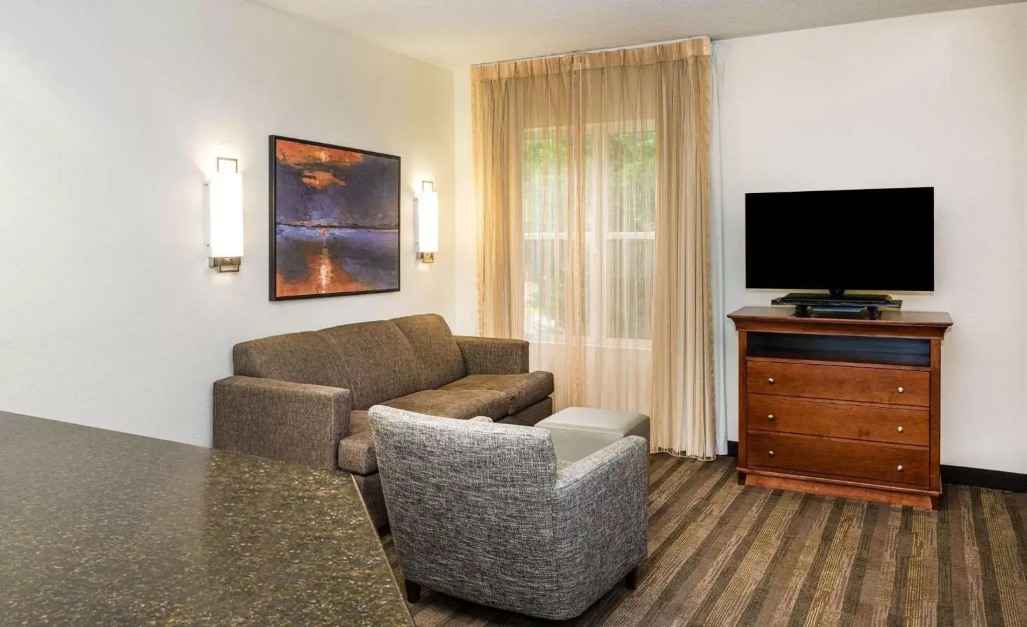 Photo of the whole room, TV/Entertainment Center in Hyatt House Herndon/Reston