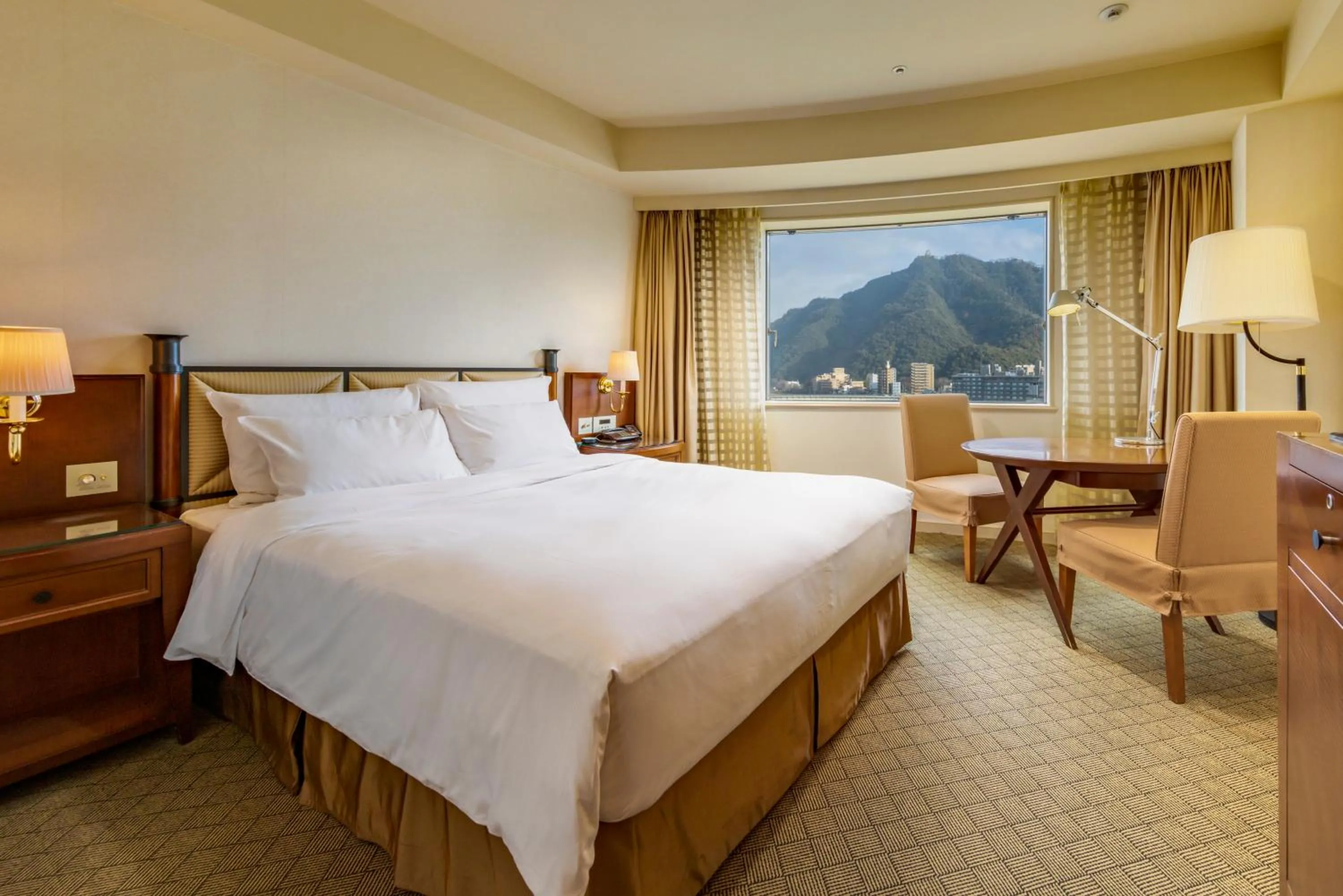 Bed in Miyako Hotel Gifu Nagaragawa