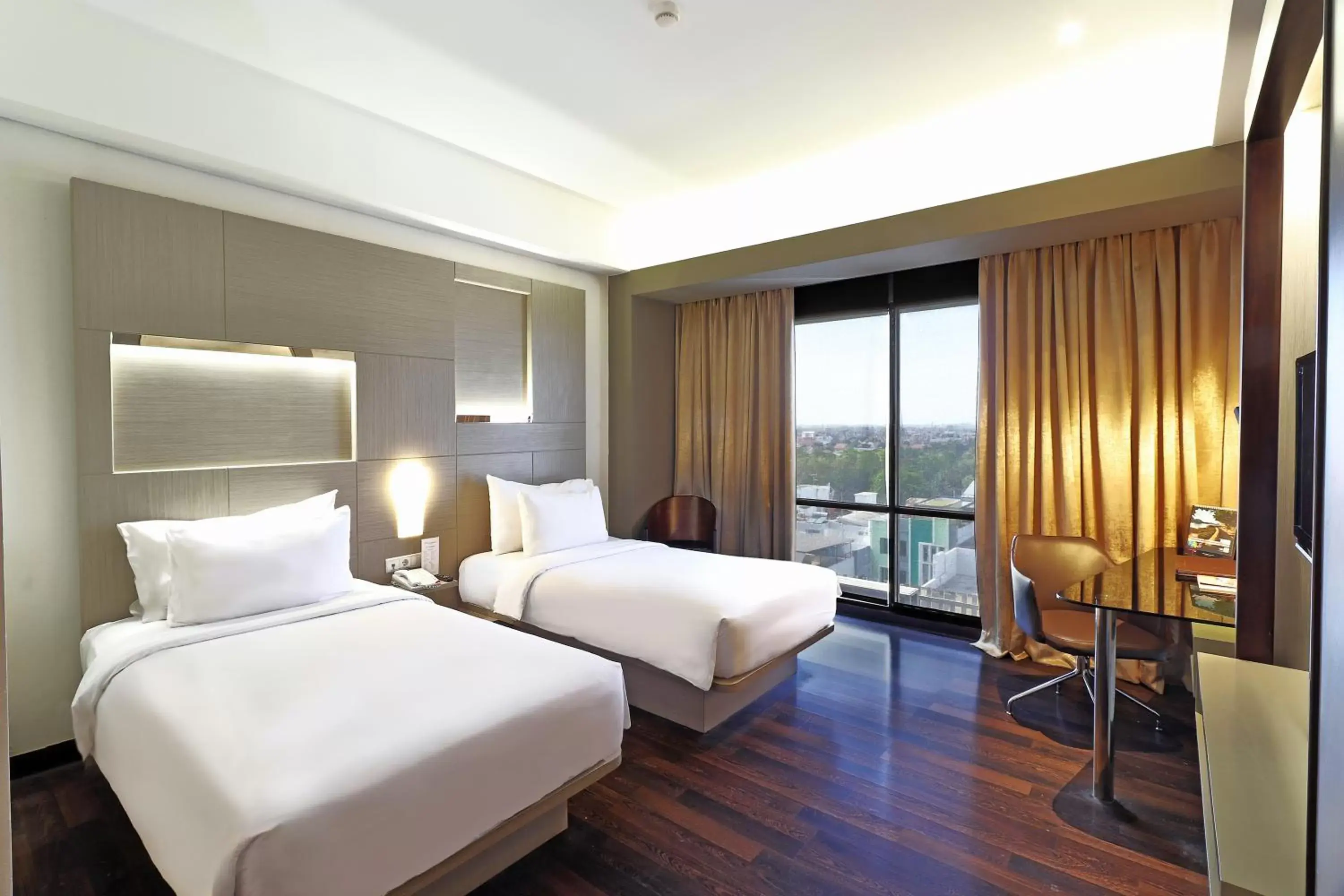 Bed in Swiss-Belhotel Cirebon