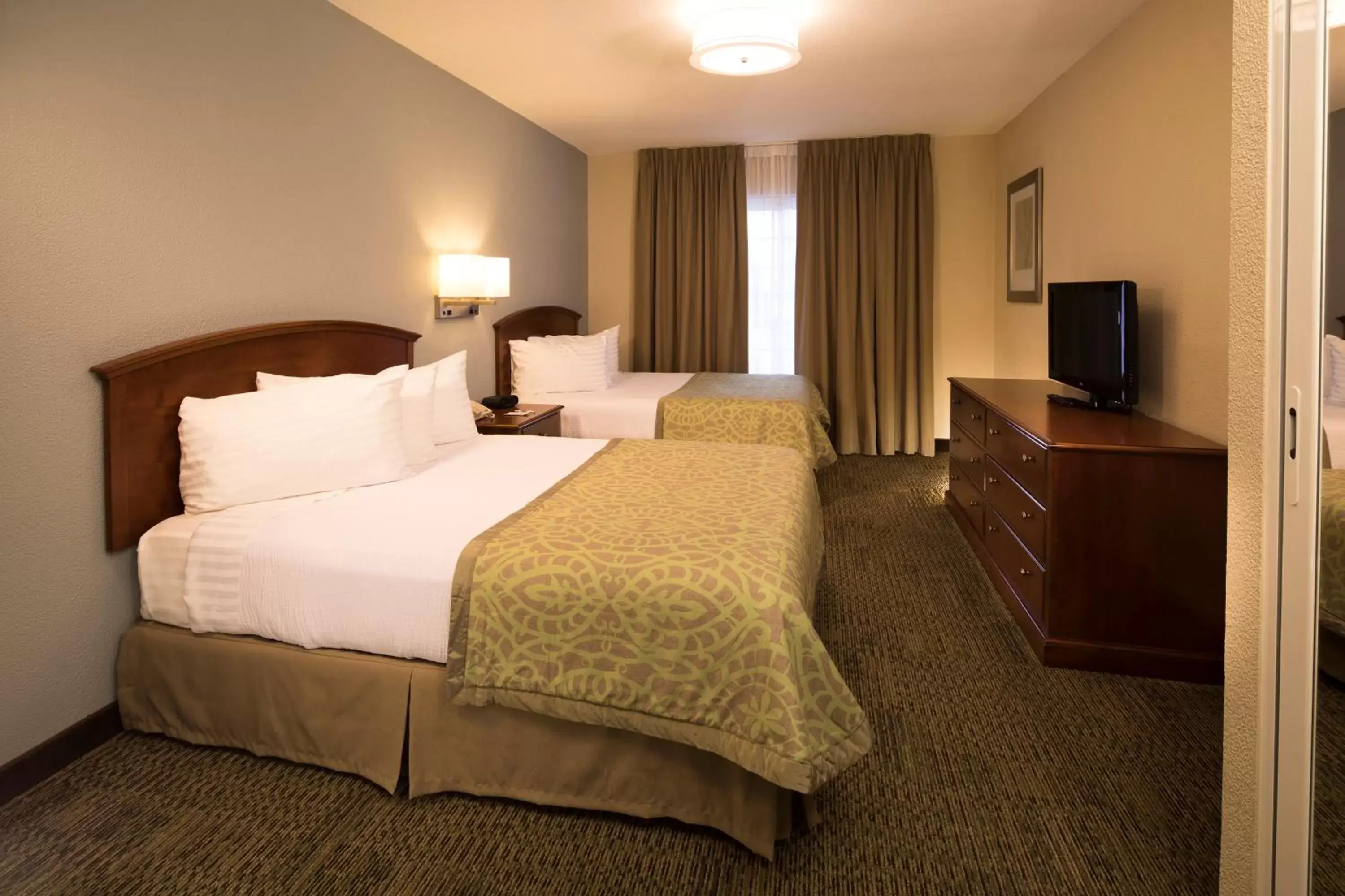 Bed in Staybridge Suites Monterrey San Pedro, an IHG Hotel