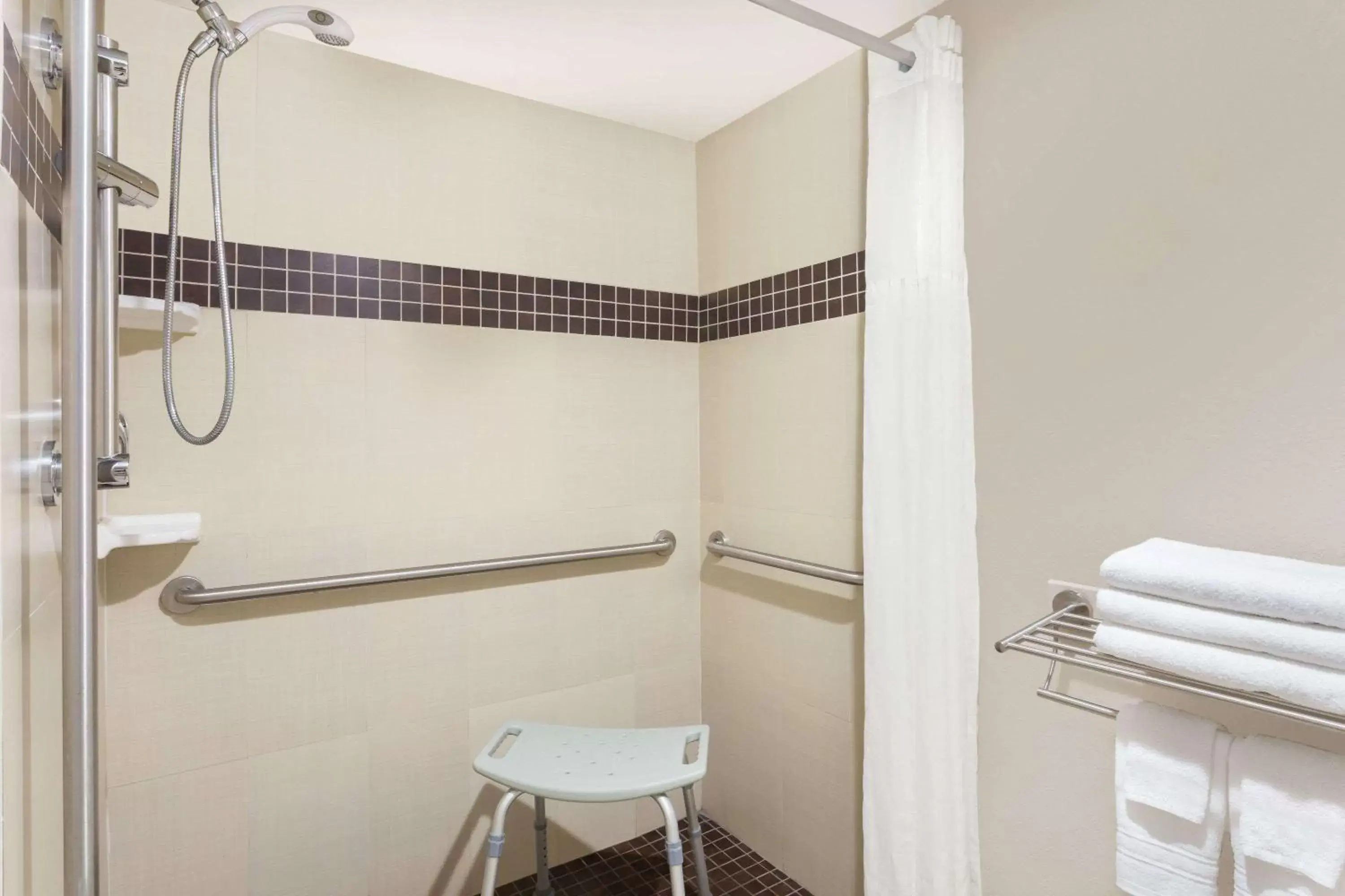 Bathroom in Super 8 by Wyndham Ellenton Bradenton Area