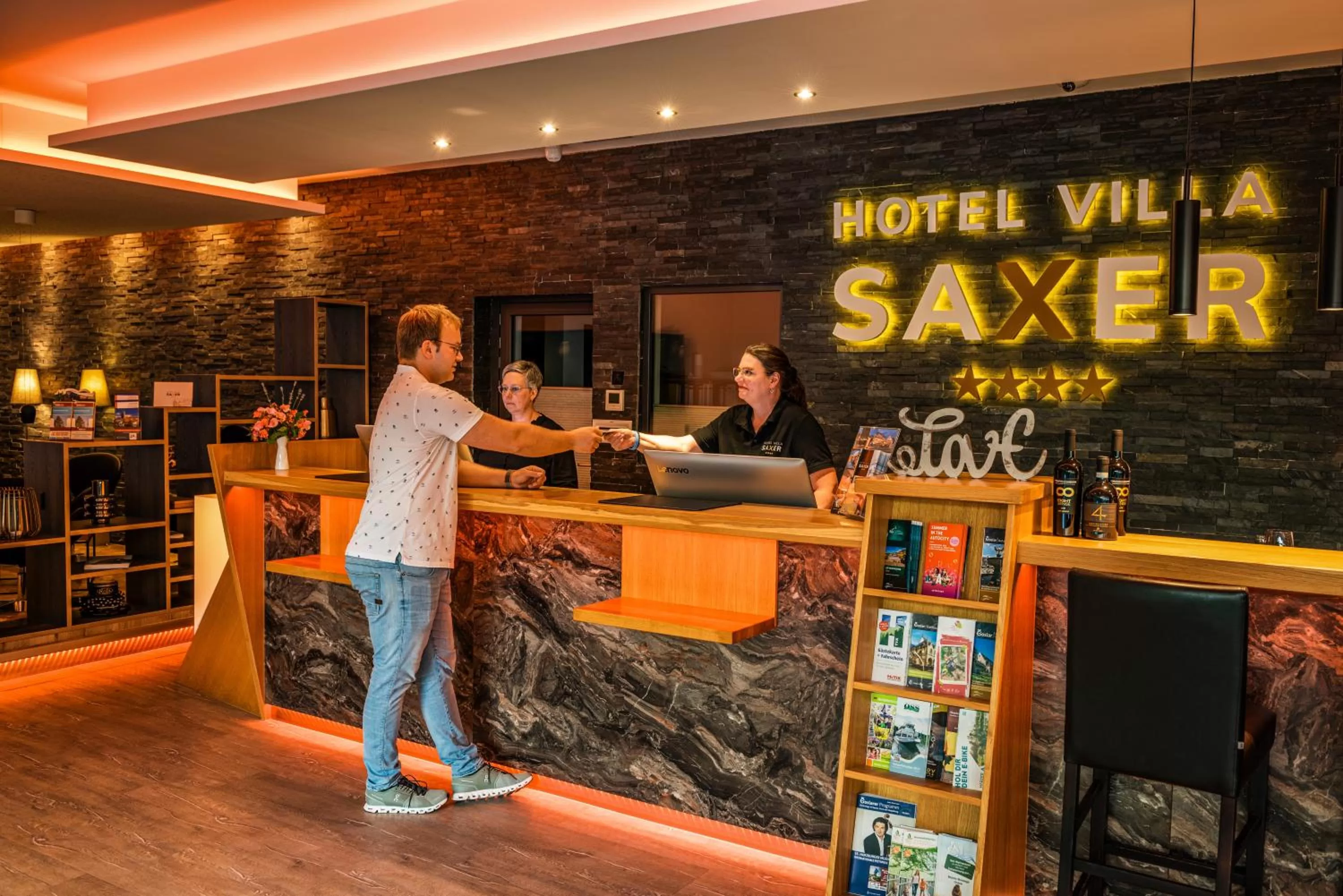 Lobby or reception in AKZENT Hotel Villa Saxer