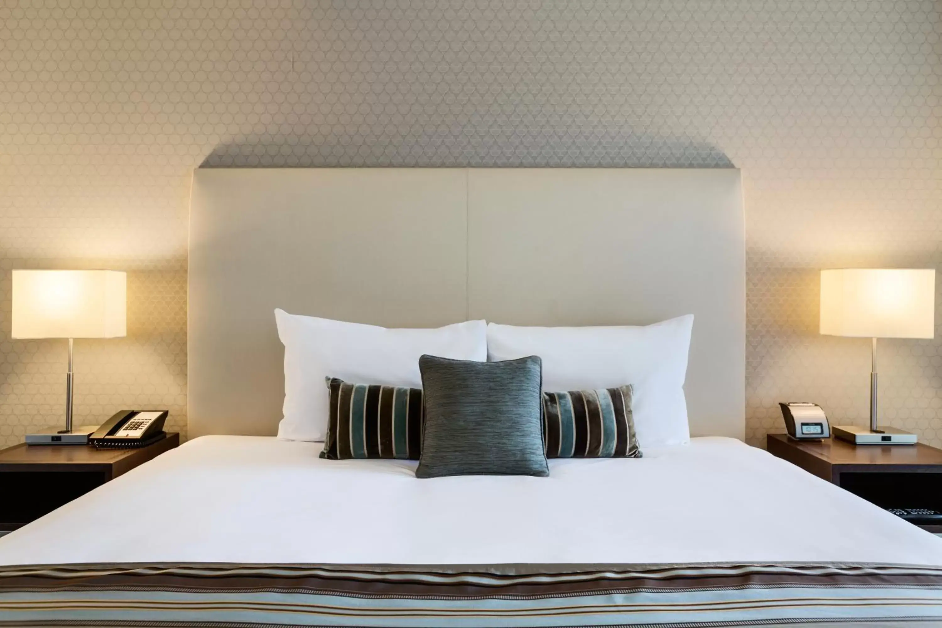 Bed in Coast Coal Harbour Vancouver Hotel by APA