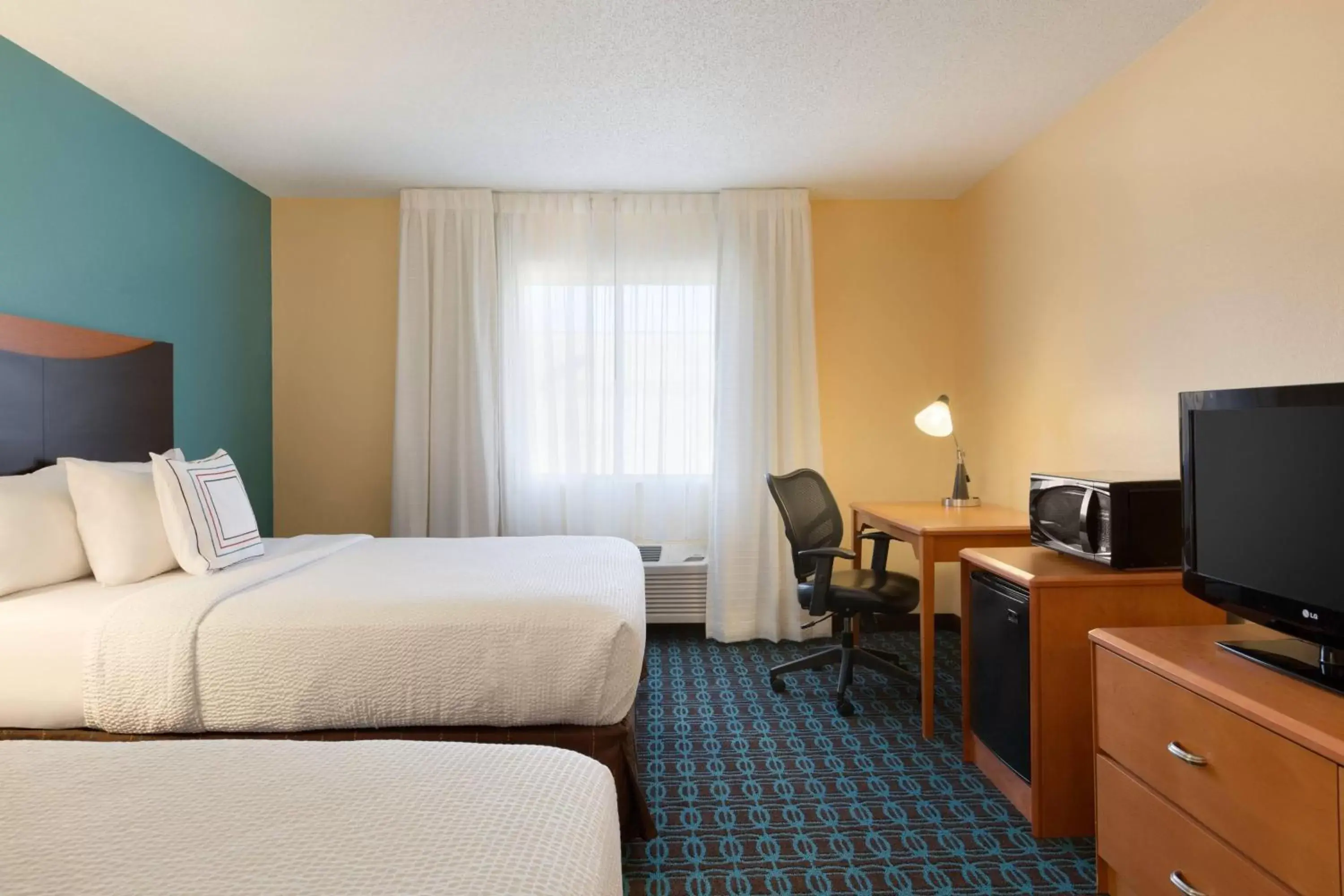 Photo of the whole room, TV/Entertainment Center in Fairfield Inn & Suites Bismarck North