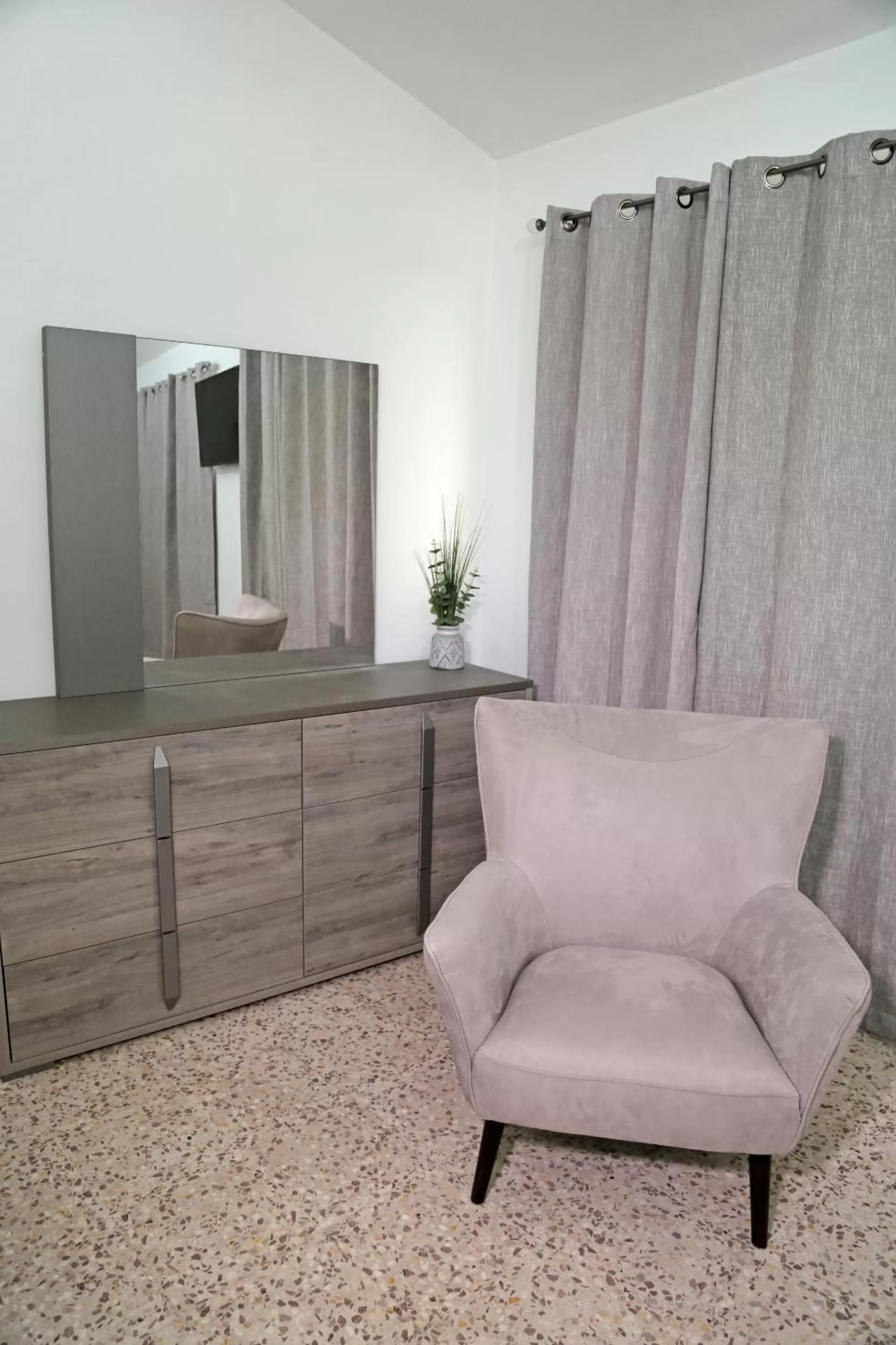 Seating area in Itza-Bella Suites