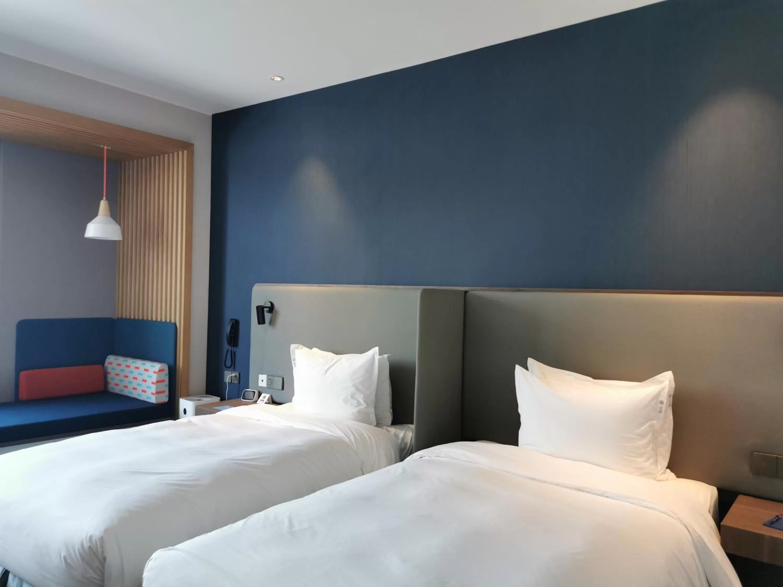 Bed in Holiday Inn Express Shanghai Kangqiao by IHG