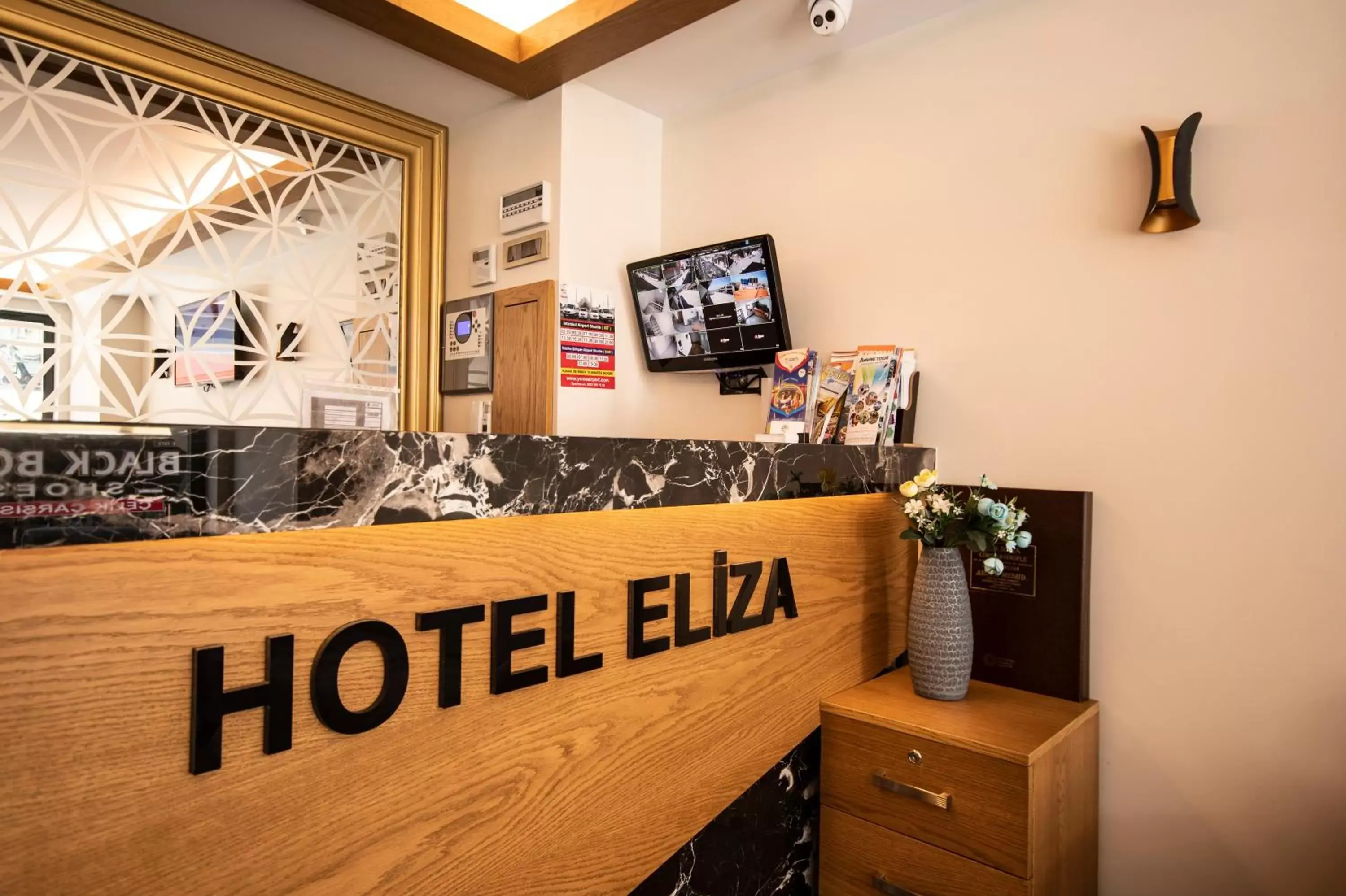 Lobby or reception in Eliza Hotel