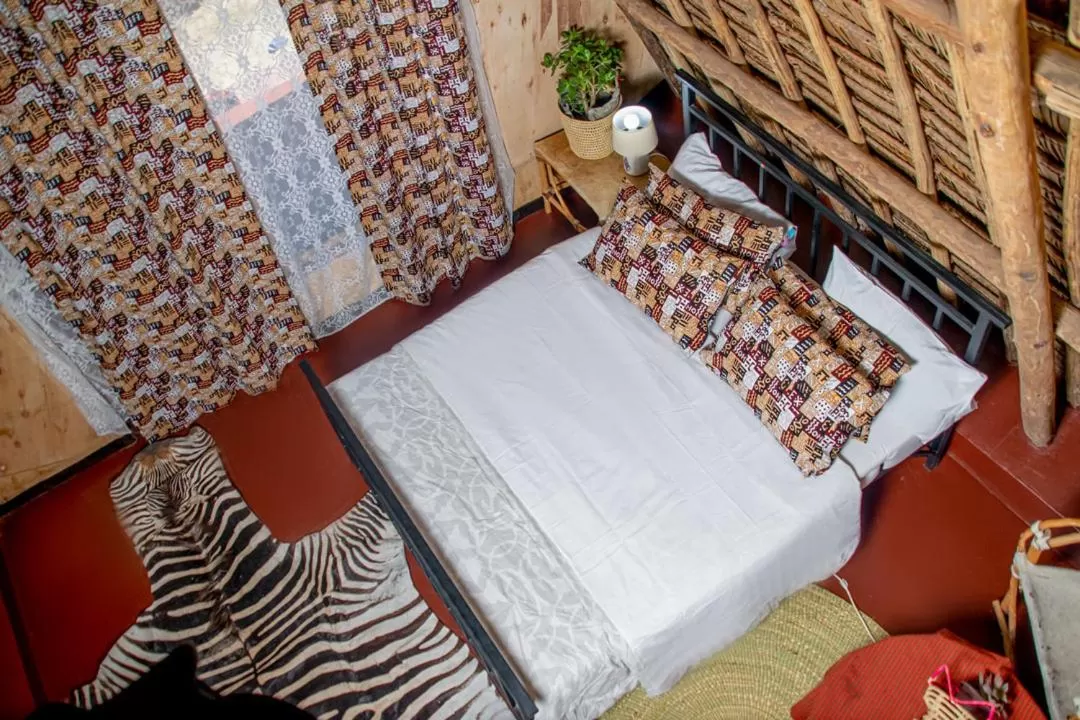 Bed in Charming Eco-Homestay near Kilimanjaro International Airport