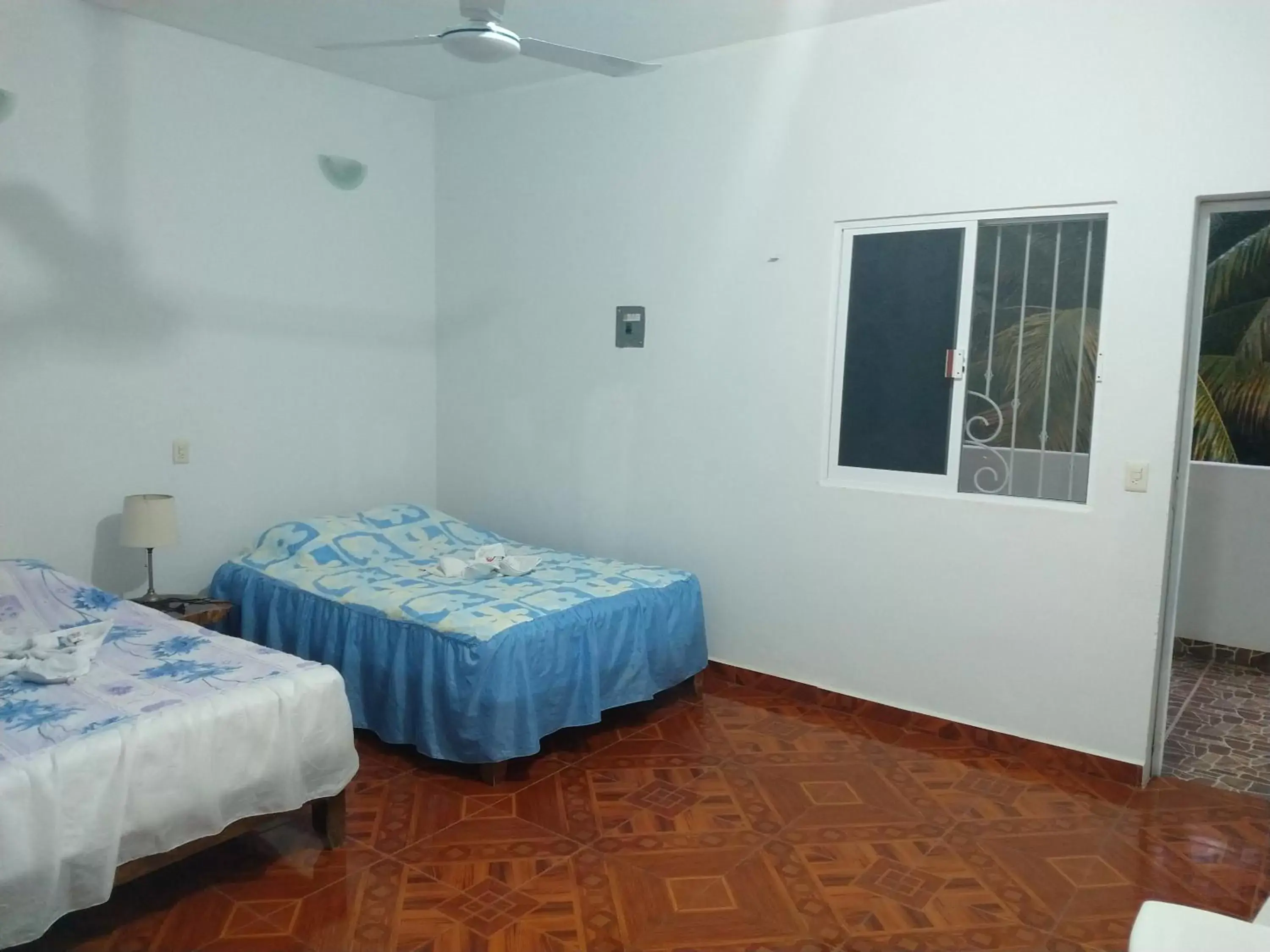 Photo of the whole room, Bed in Blue Hotel