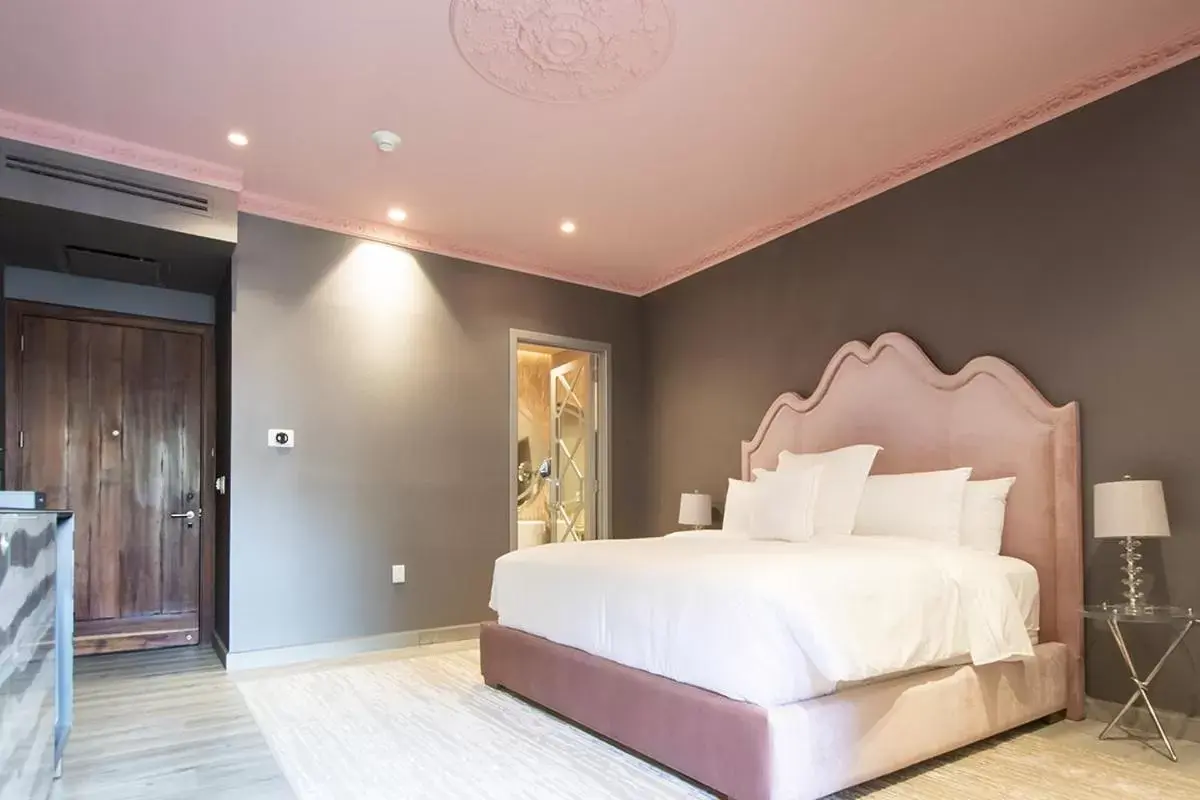 Bed in L Hotel Perla Boutique