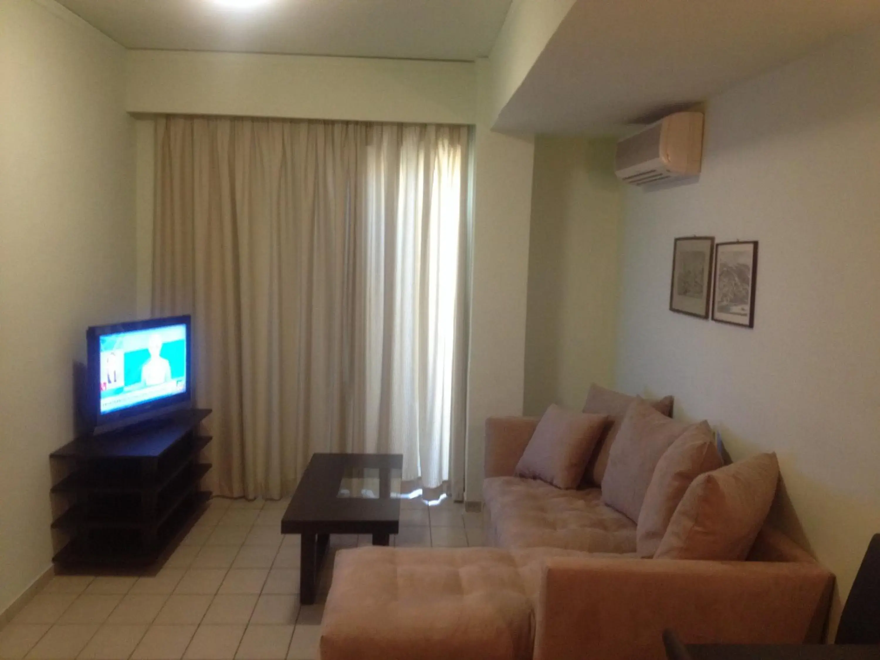 TV and multimedia, Seating Area in Jason Hotel