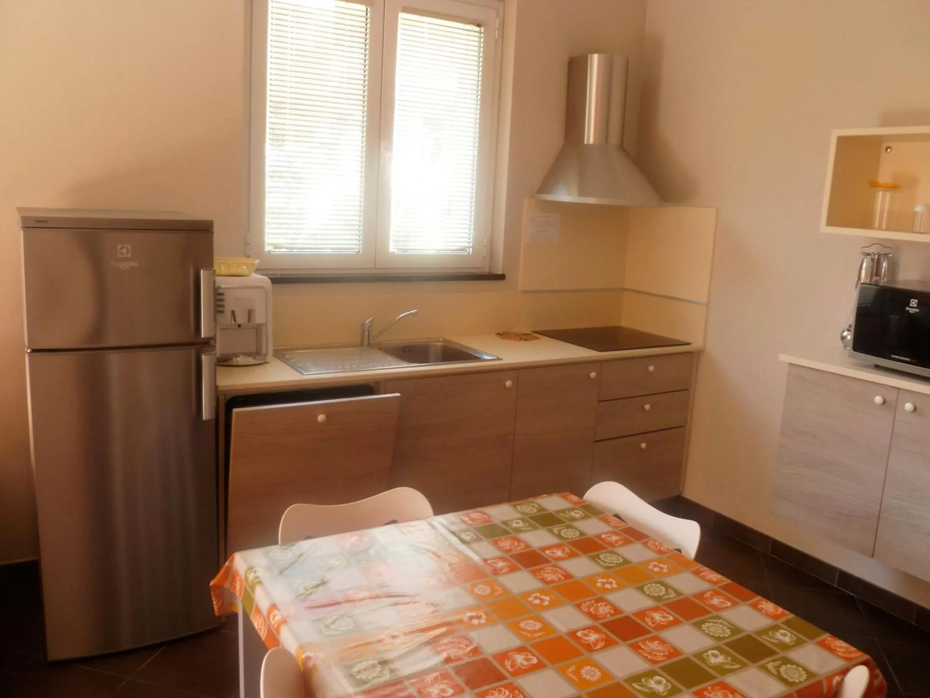 Kitchen/Kitchenette in Le Vele Residence