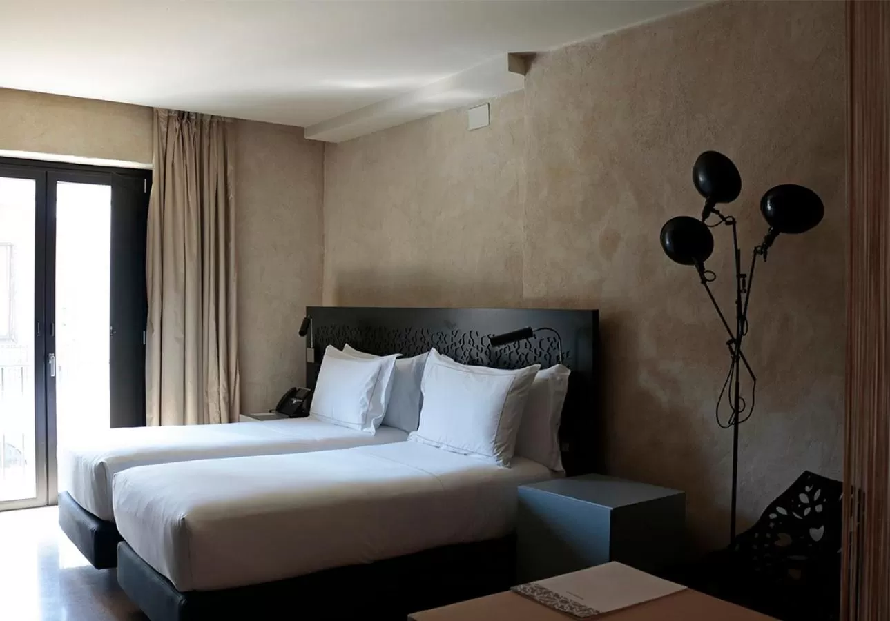 Bed in EME Catedral Mercer Hotel