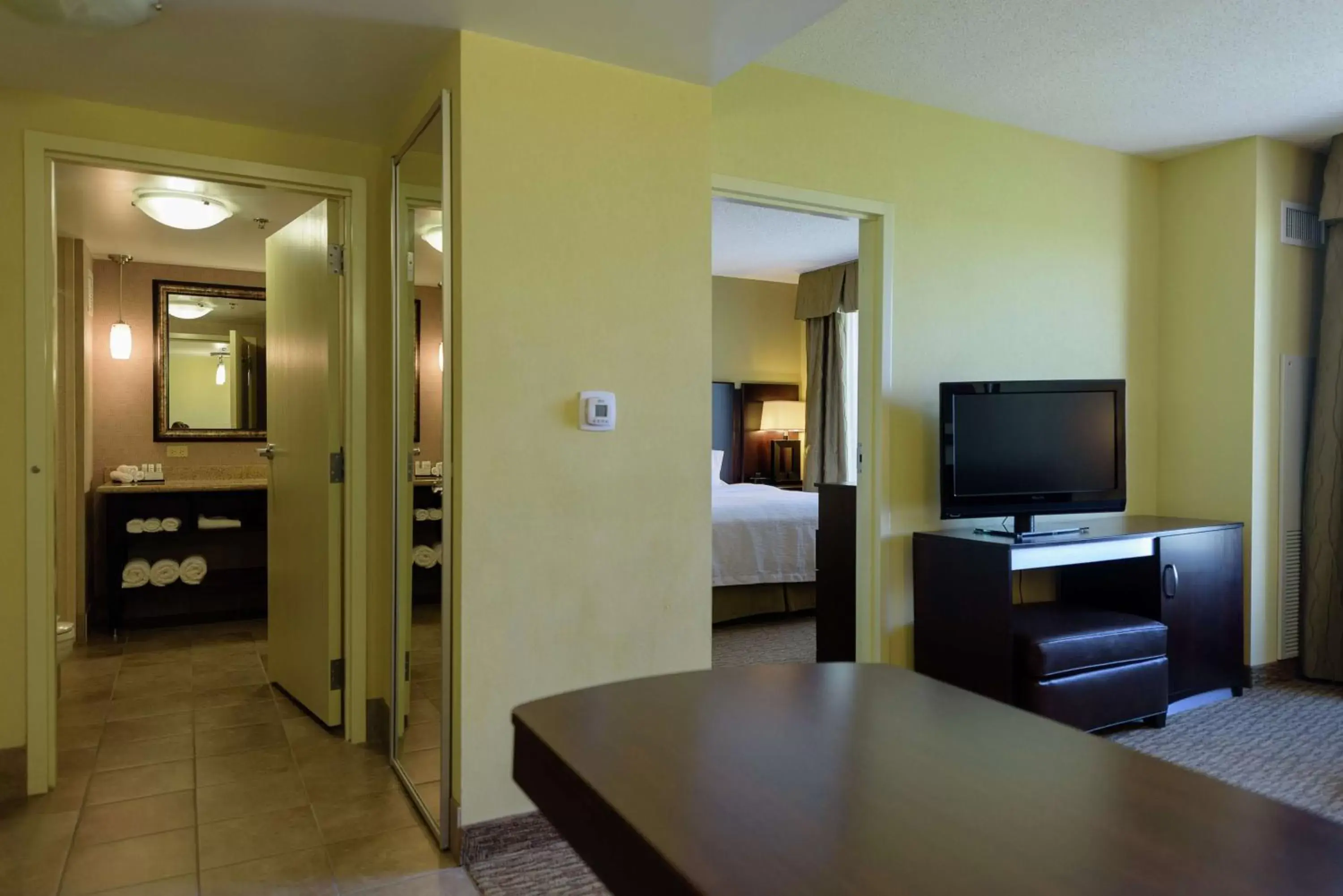 Bedroom, TV/Entertainment Center in Embassy Suites by Hilton Minneapolis North