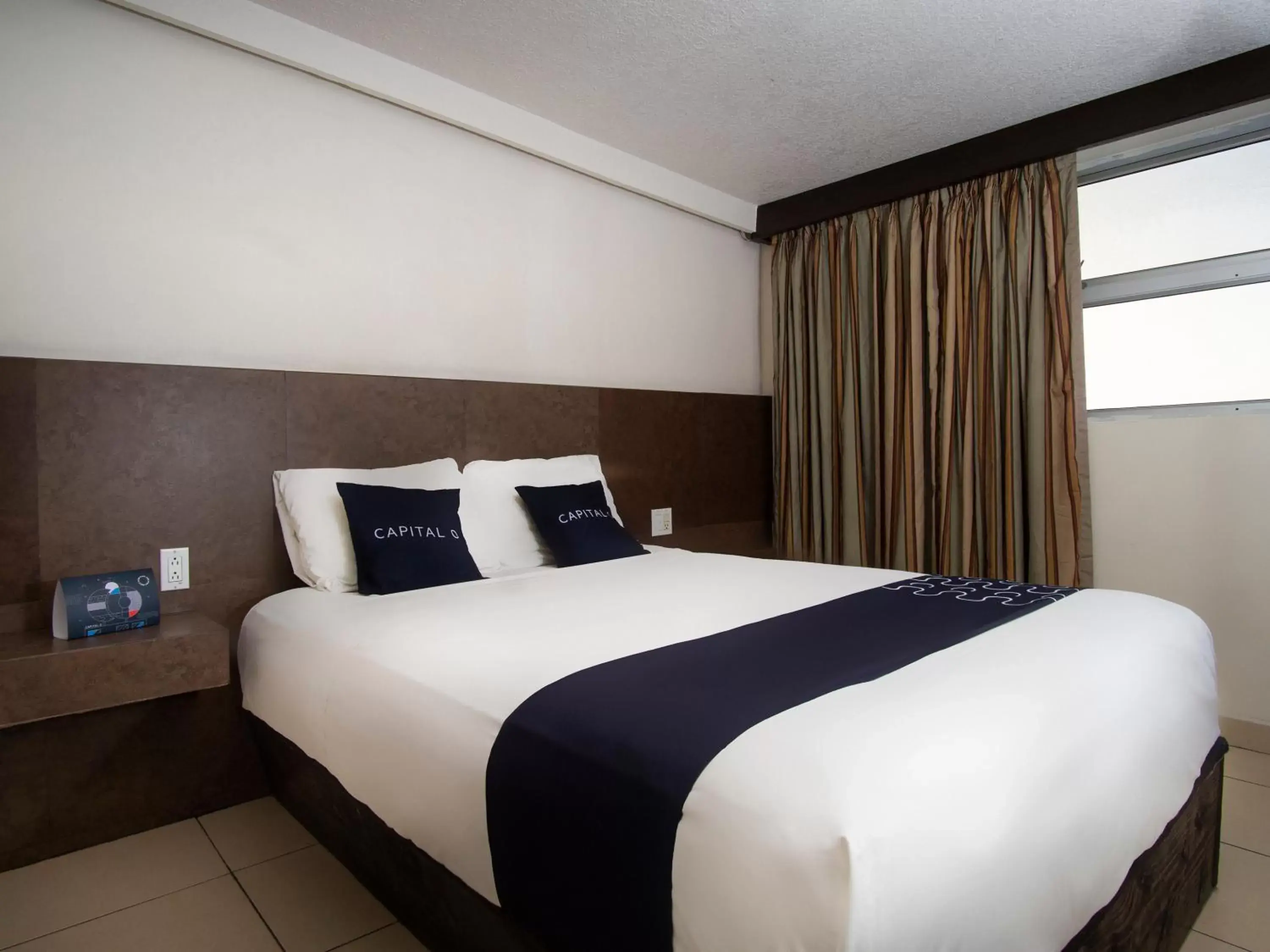 Bedroom, Bed in CAPITAL O Hotel Rose, Ensenada