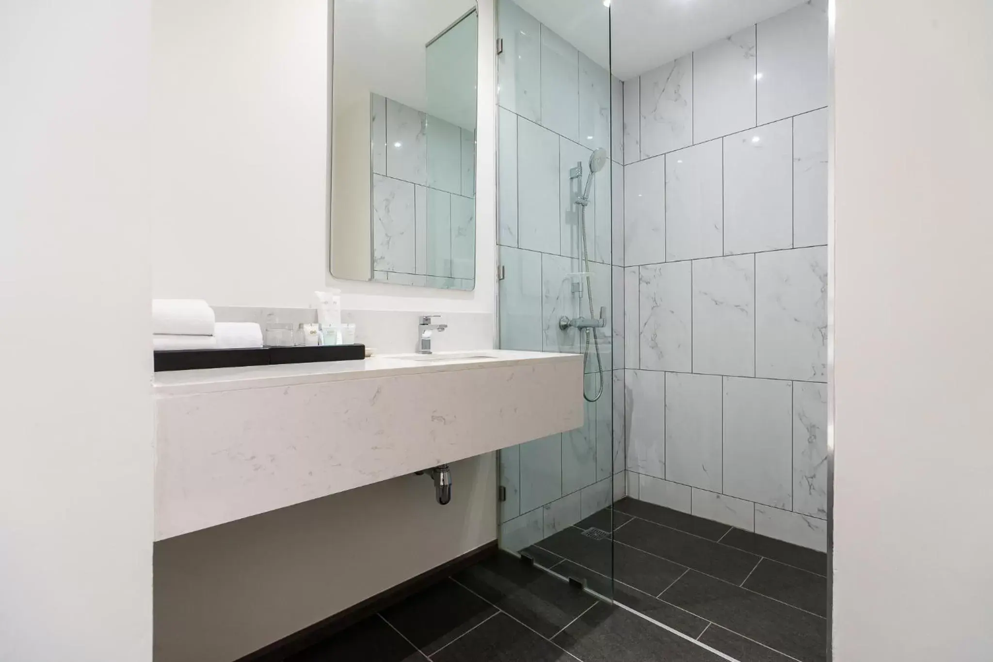 Shower, Bathroom in One Patio Hotel Pattaya - SHA Extra Plus