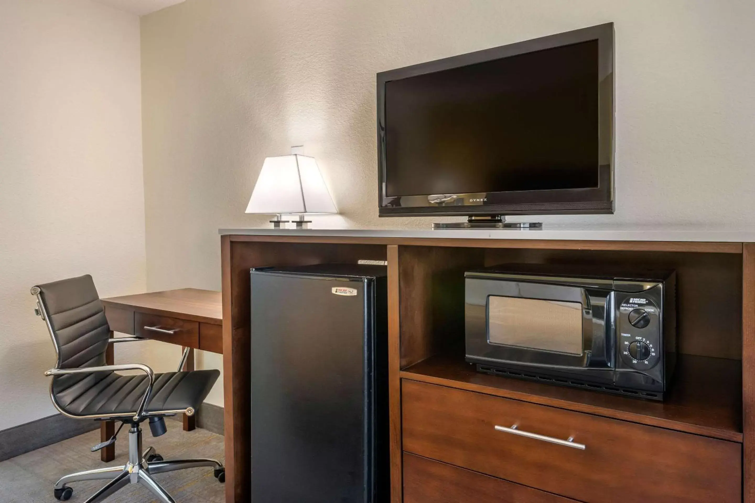 Photo of the whole room, TV/Entertainment Center in Quality Inn and Suites Riverfront