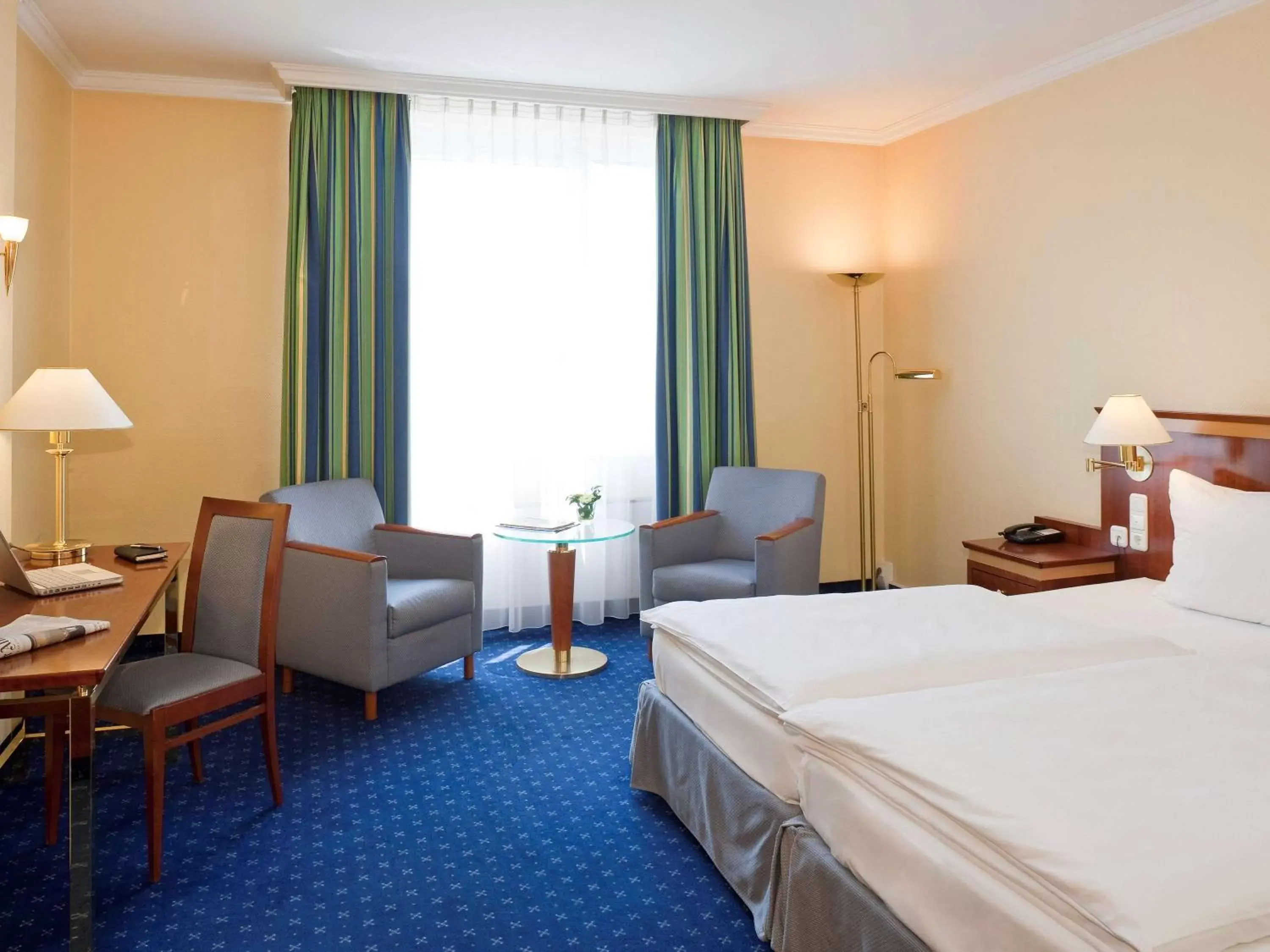 Photo of the whole room, Bed in Mercure Hotel Trier Porta Nigra