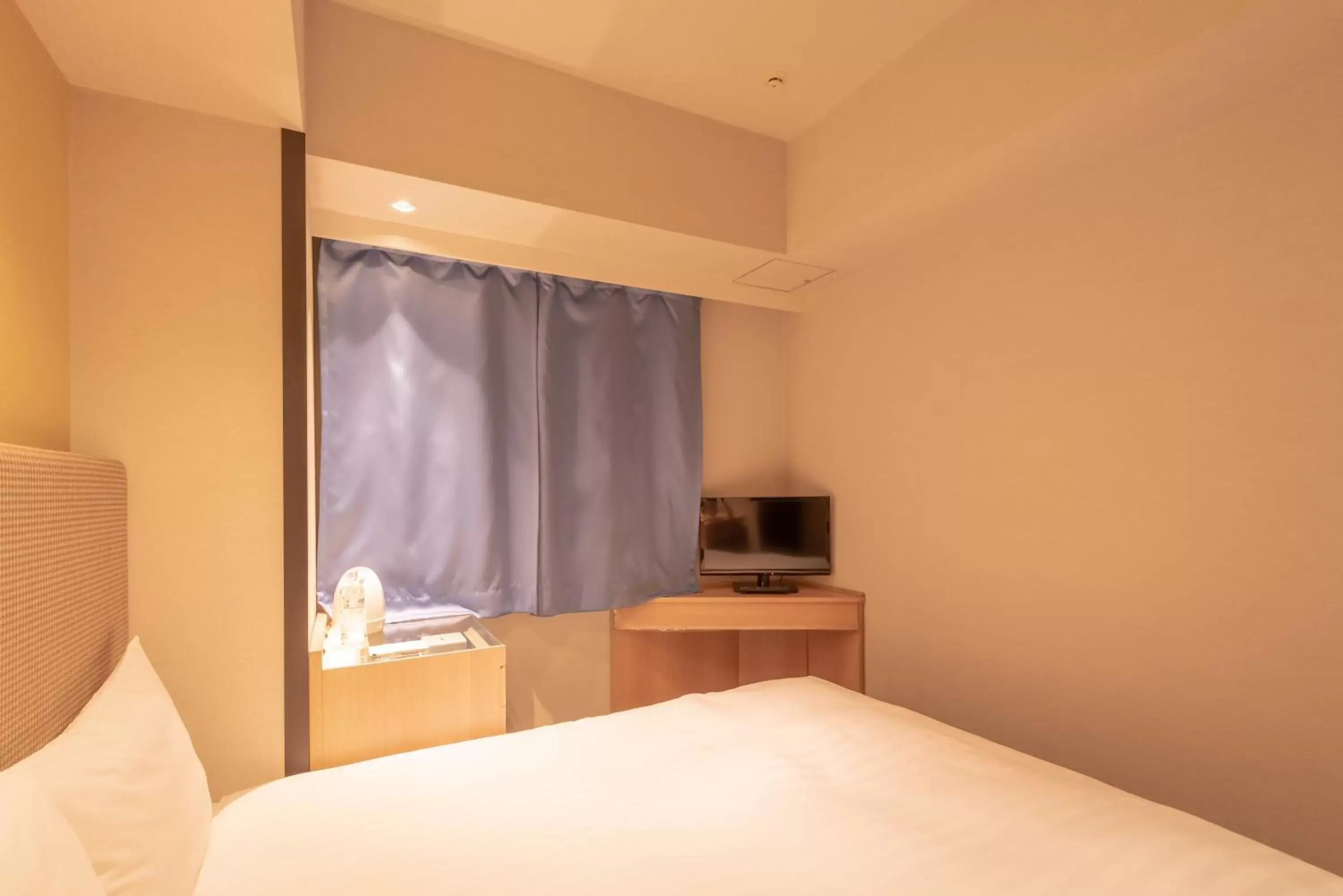 Bed in E Hotel Higashi Shinjuku