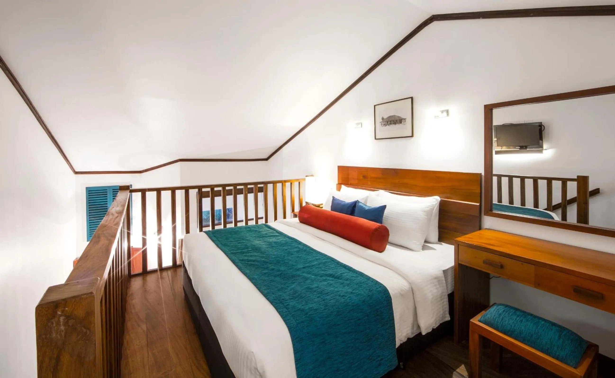 Bed in Tangerine Beach Hotel