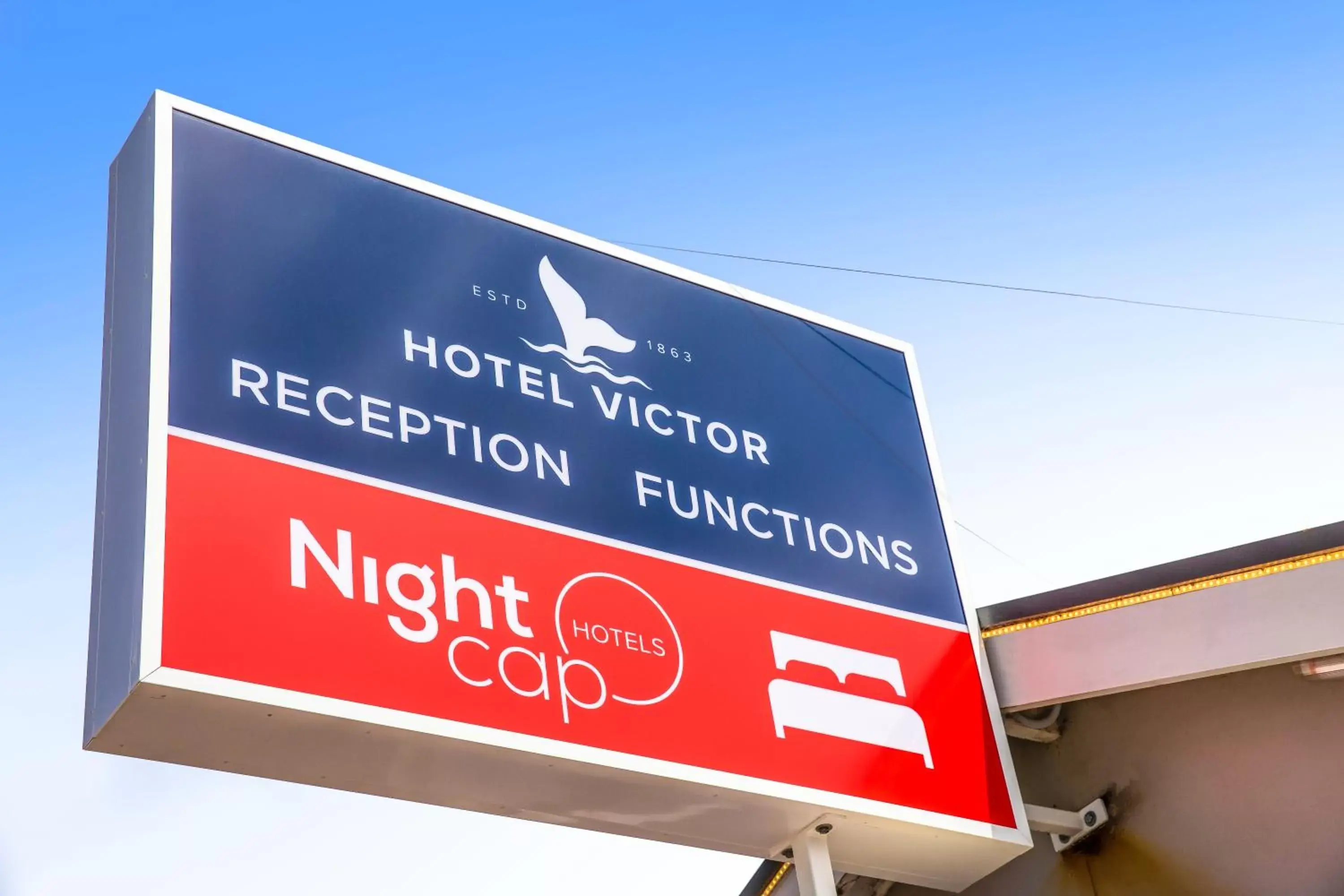 Property logo or sign in Nightcap at Hotel Victor