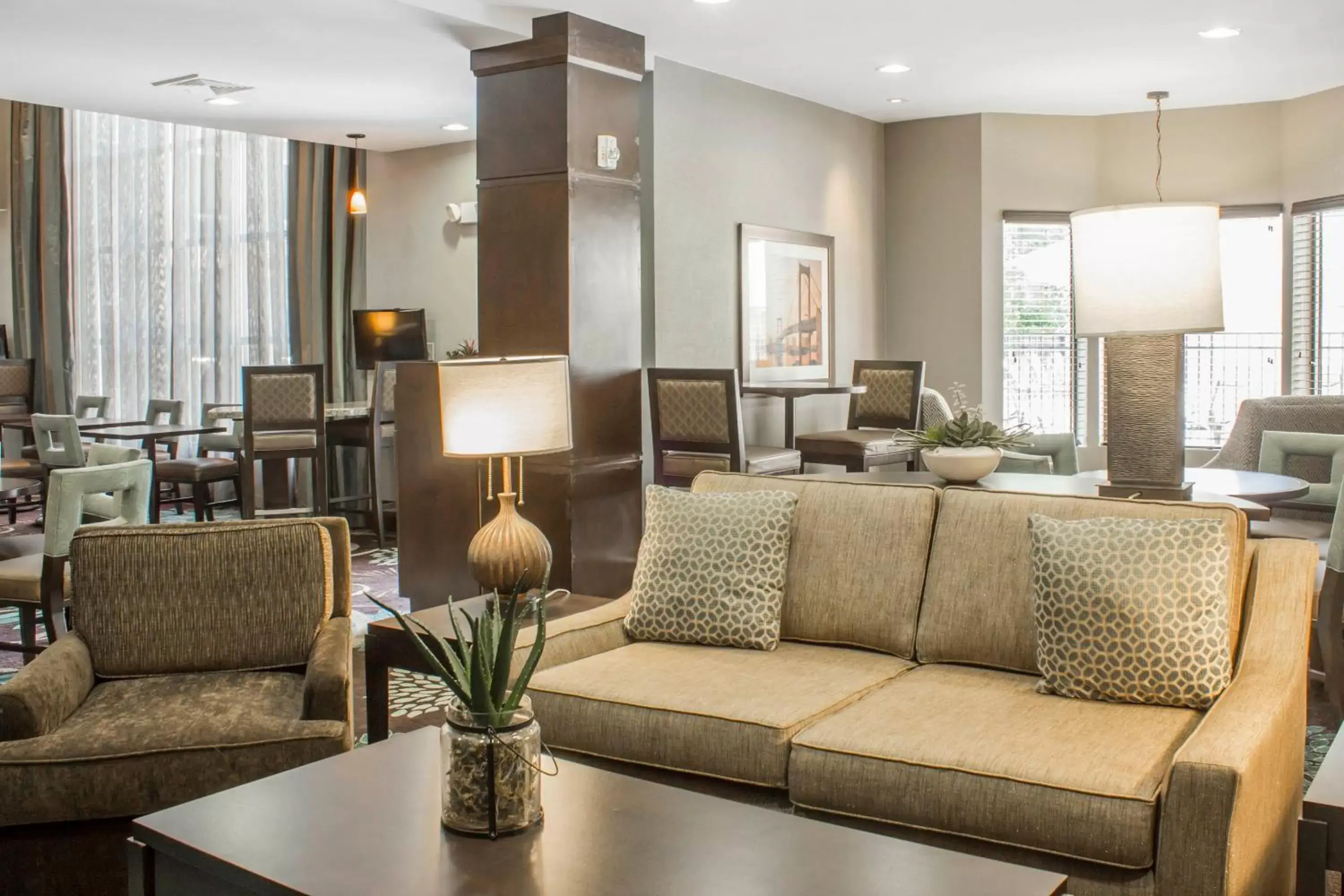 Lobby or reception, Seating Area in Staybridge Suites North Jacksonville, an IHG Hotel