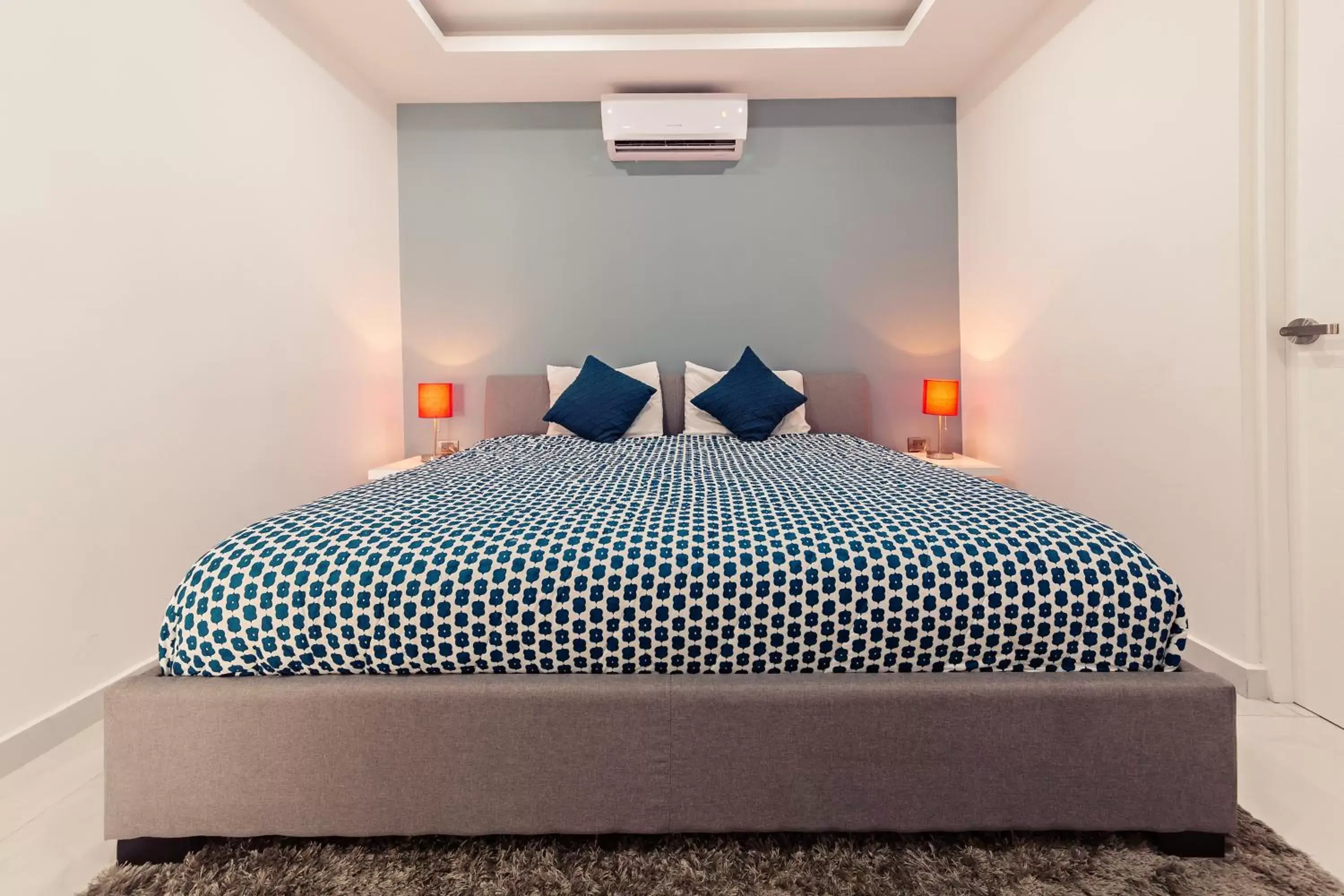 Bed in Mararena Condos by Nah Hotels