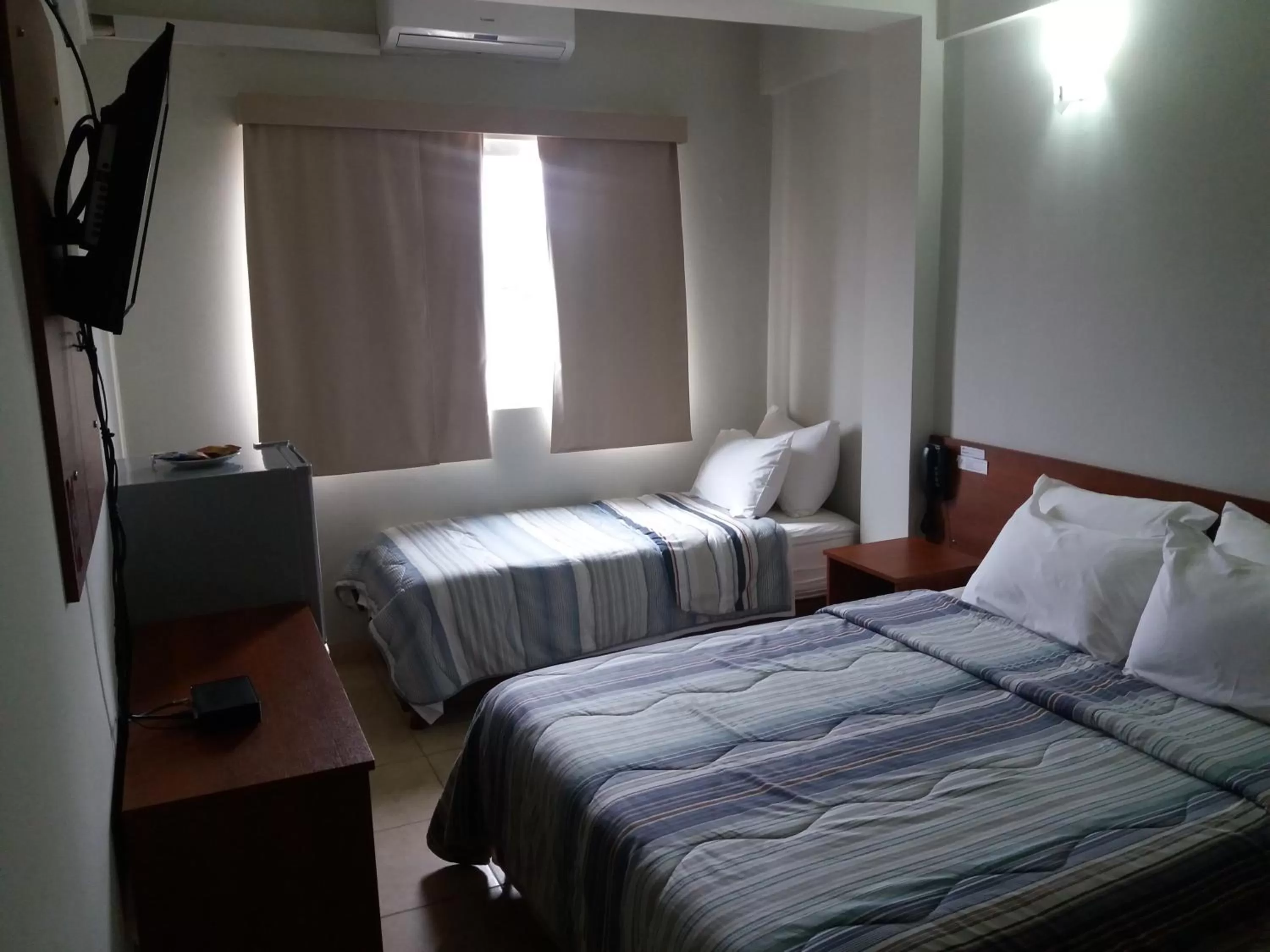 Bed in Madame Lynch Hotel Asuncion