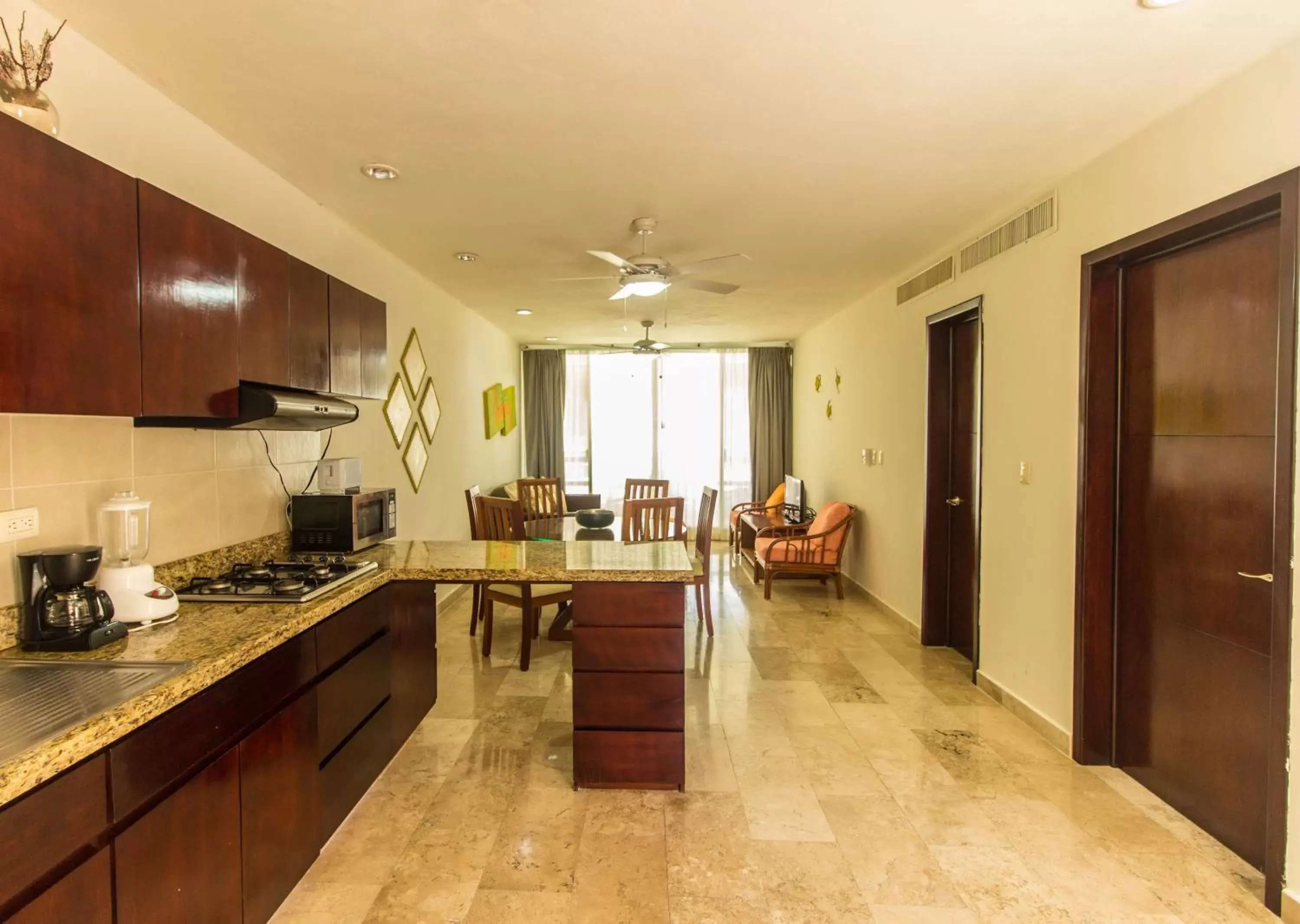 Kitchen or kitchenette in Coral Maya Stay Suites