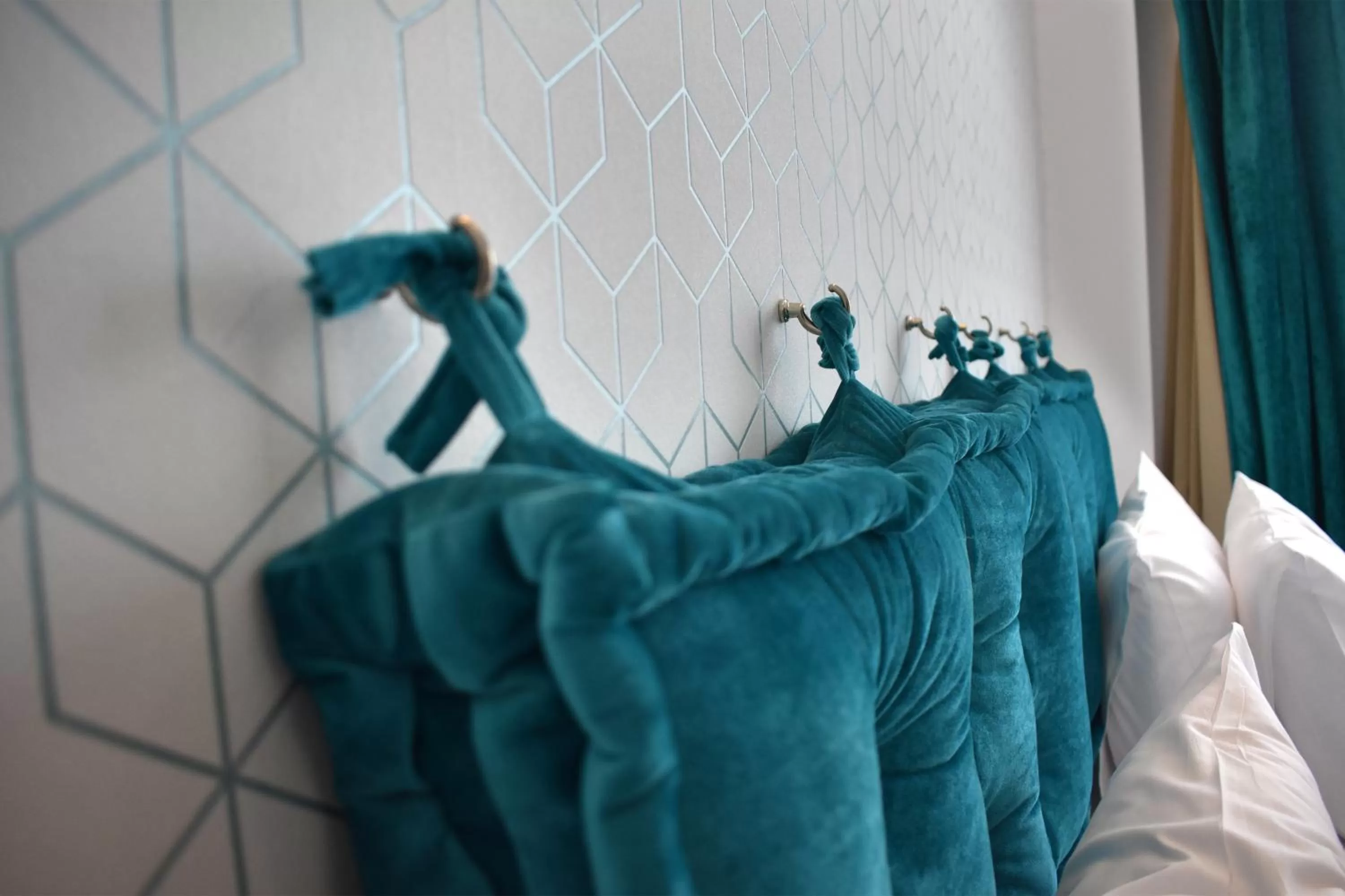 Bed in Athenian Montaza Hotel