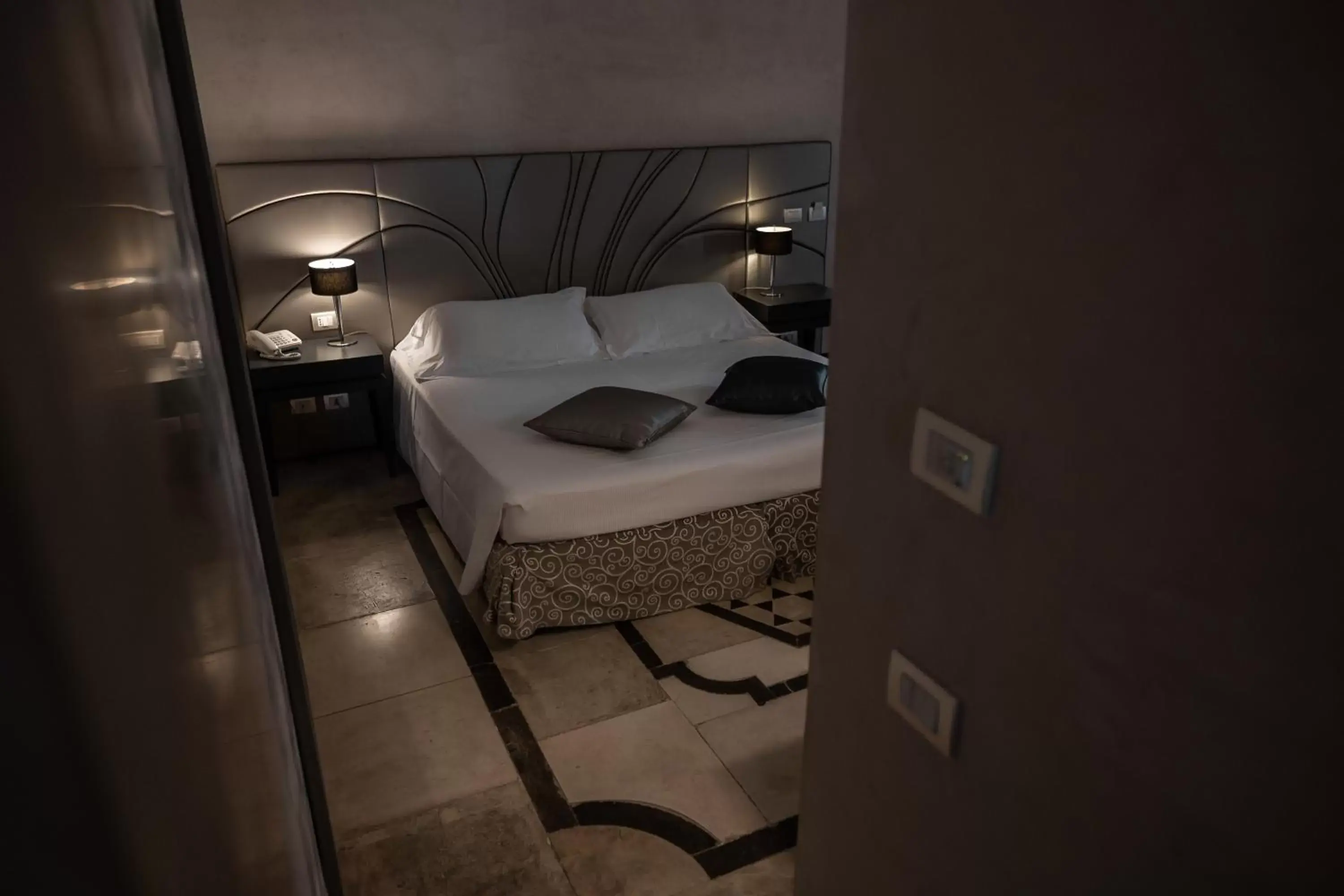 Bed in De Stefano Palace Luxury Hotel