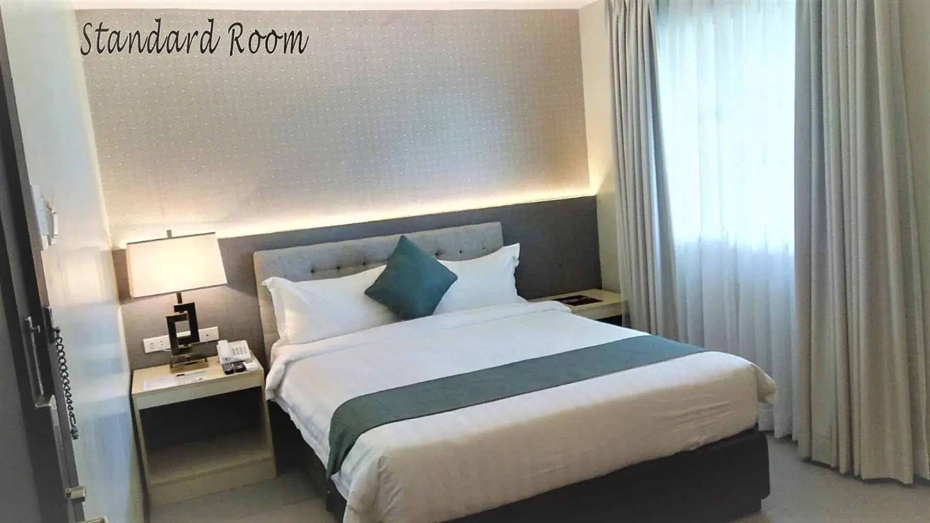 Bed in J7 HOTEL