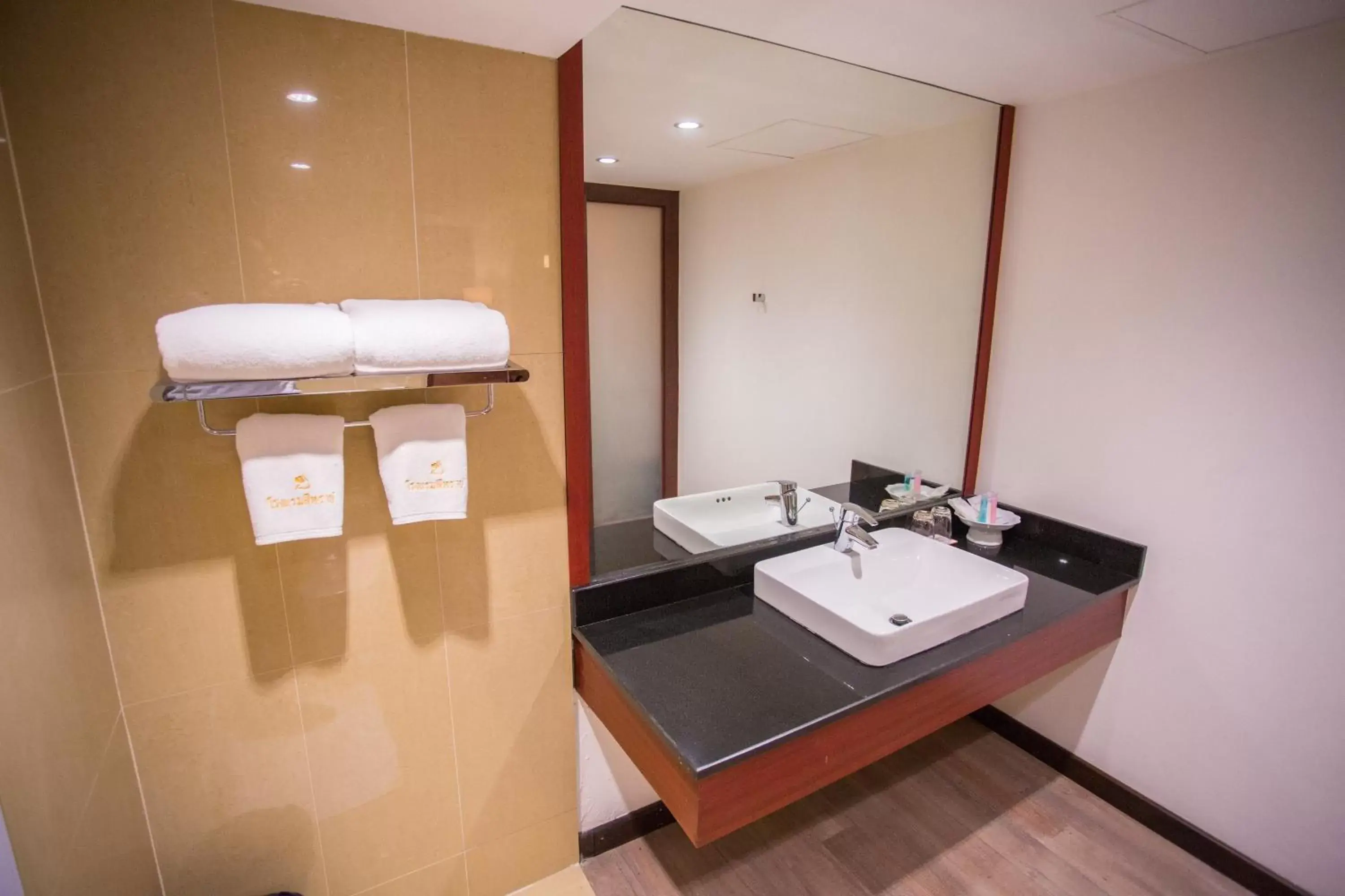 Bathroom in Seeharaj Hotel Bathroom in Seeharaj Hotel