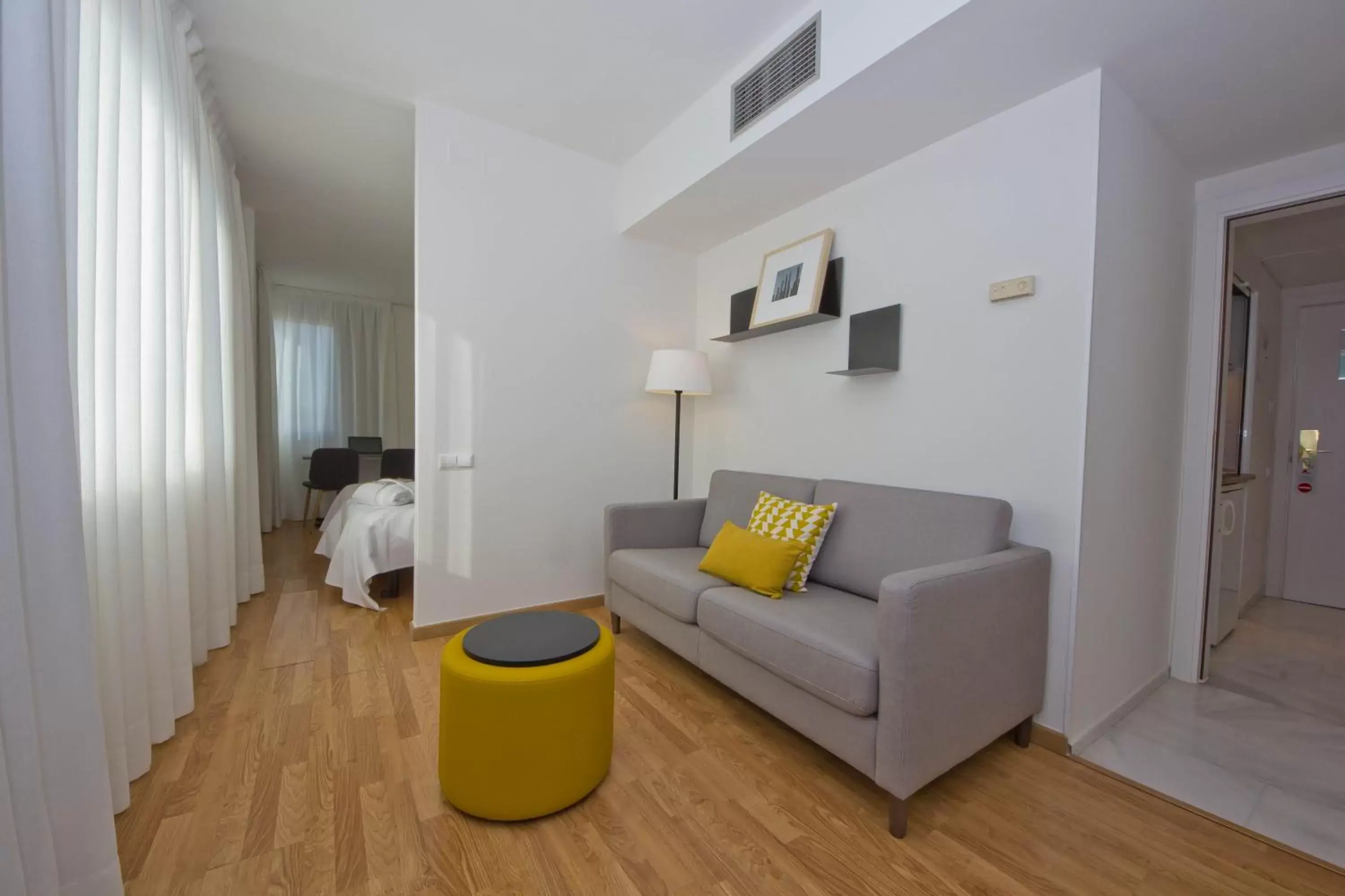 Living room, Bed in Aparthotel Atenea Valles Living room, Bed in Aparthotel Atenea Valles