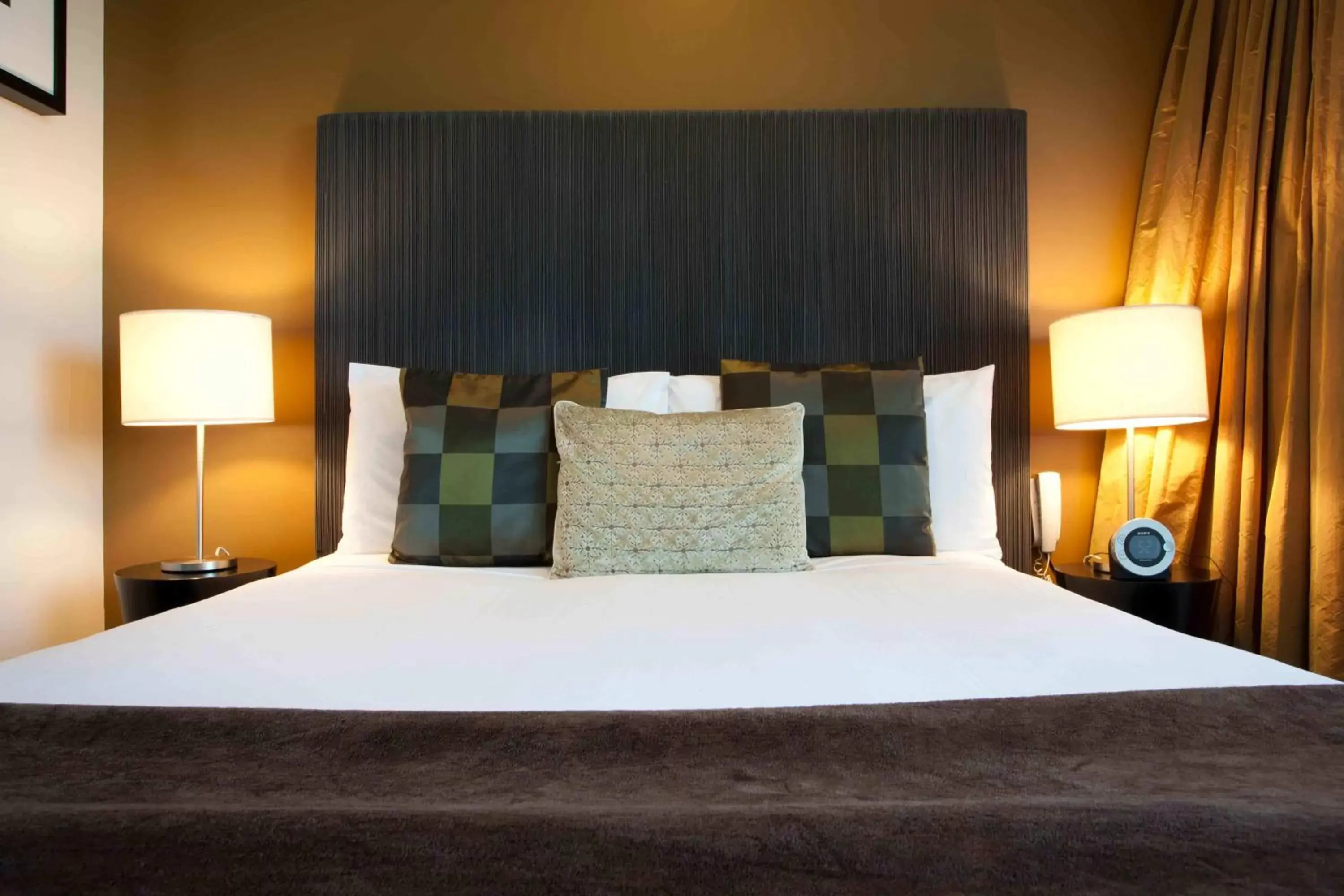 Bed in The Quadrant Hotel & Suites