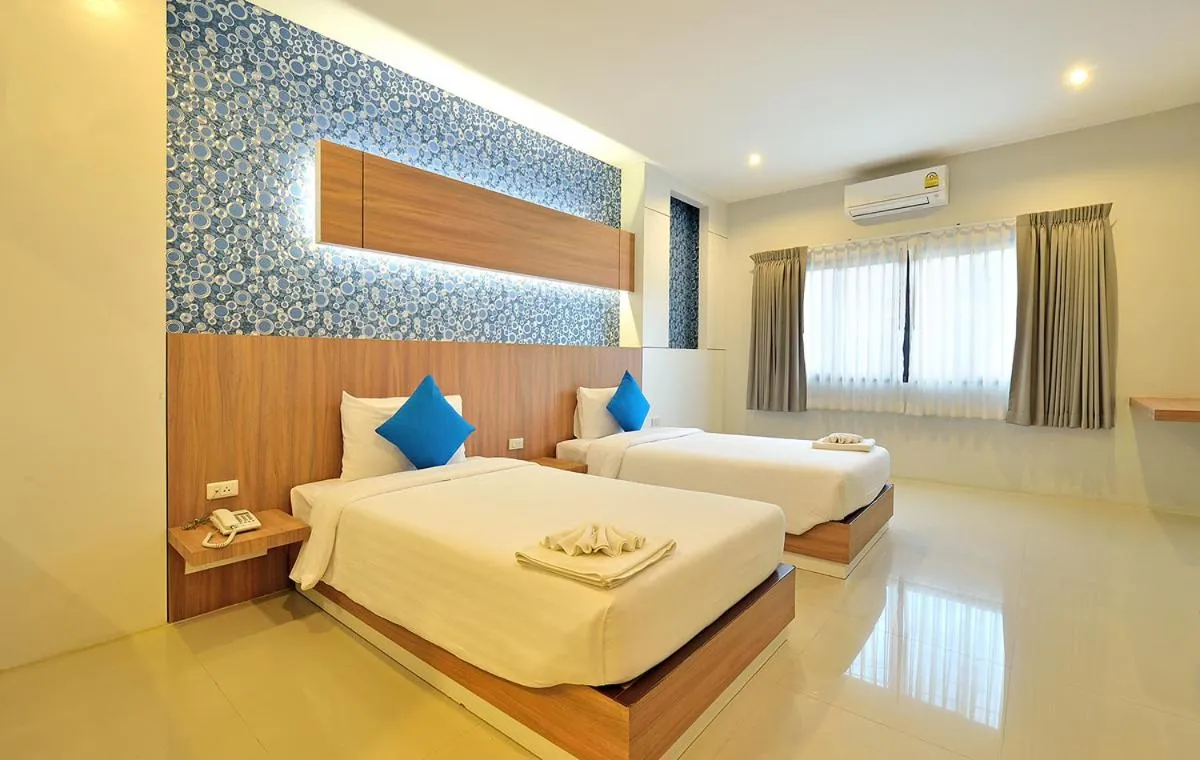 Bed in Tairada Boutique Hotel